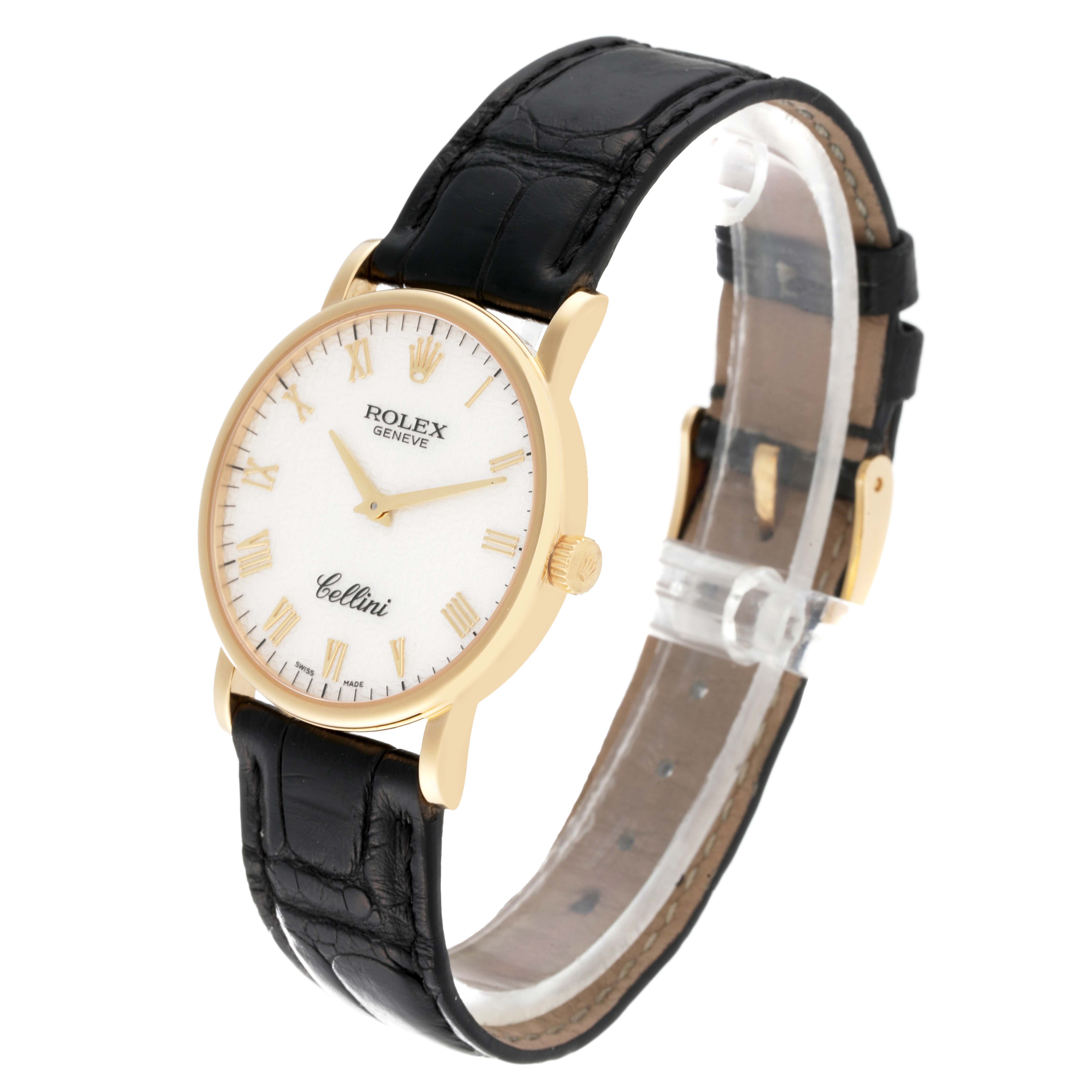 This image shows a Rolex Cellini 5115 Men's Yellow Gold White Dial 5115 Men's Yellow Gold White Dial watch at a slight angle, displaying its face, bezel, and black leather strap.