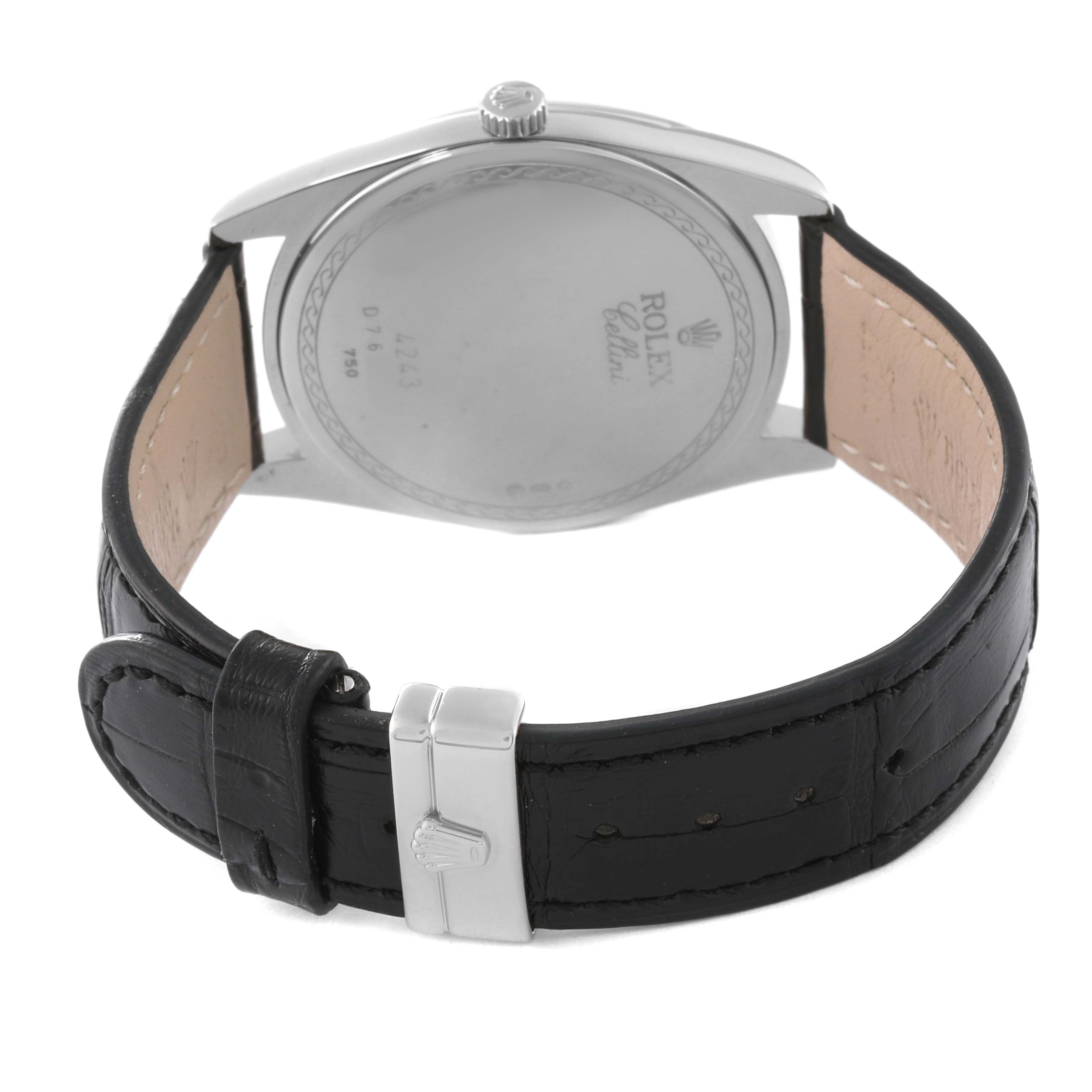 The image shows the backside of the Rolex Cellini 4243 Men's White Gold Black Dial 4243 Men's White Gold Black Dial watch, displaying the case back and black leather strap with a clasp.