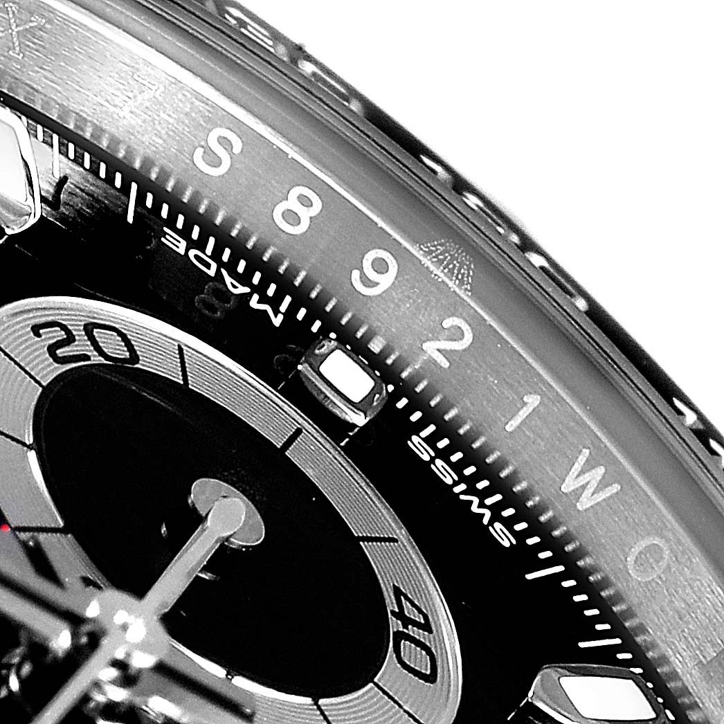 This close-up image showcases the dial and tachymeter scale of a Rolex Daytona 116500 Men's Stainless Steel Black Dial 116500 Men's Stainless Steel Black Dial watch.