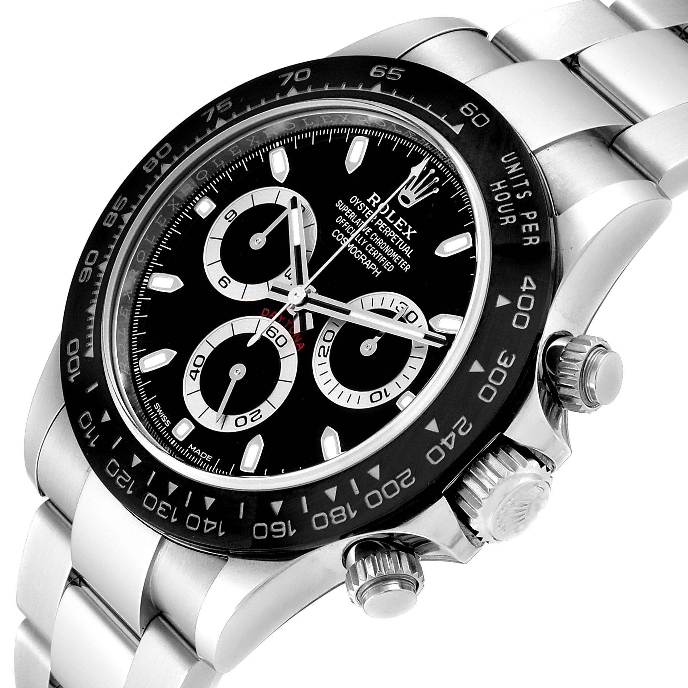 This image shows a close-up angle of the Rolex Daytona 116500 Men's Stainless Steel Black Dial 116500 Men's Stainless Steel Black Dial watch, featuring its bezel, dial, and chronograph pushers.