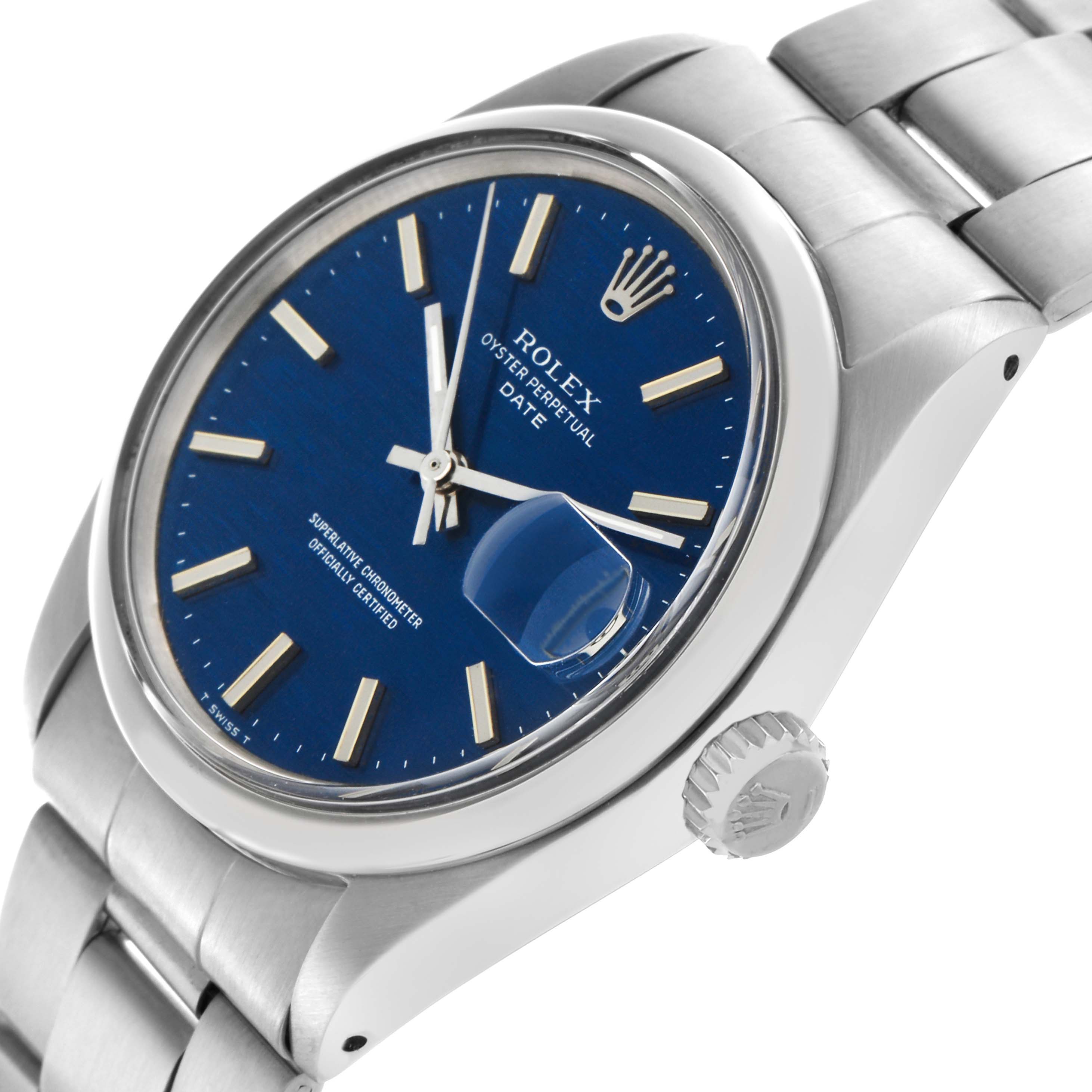 The Rolex Date watch is shown at an angled side view highlighting the blue dial, crown, and bracelet.