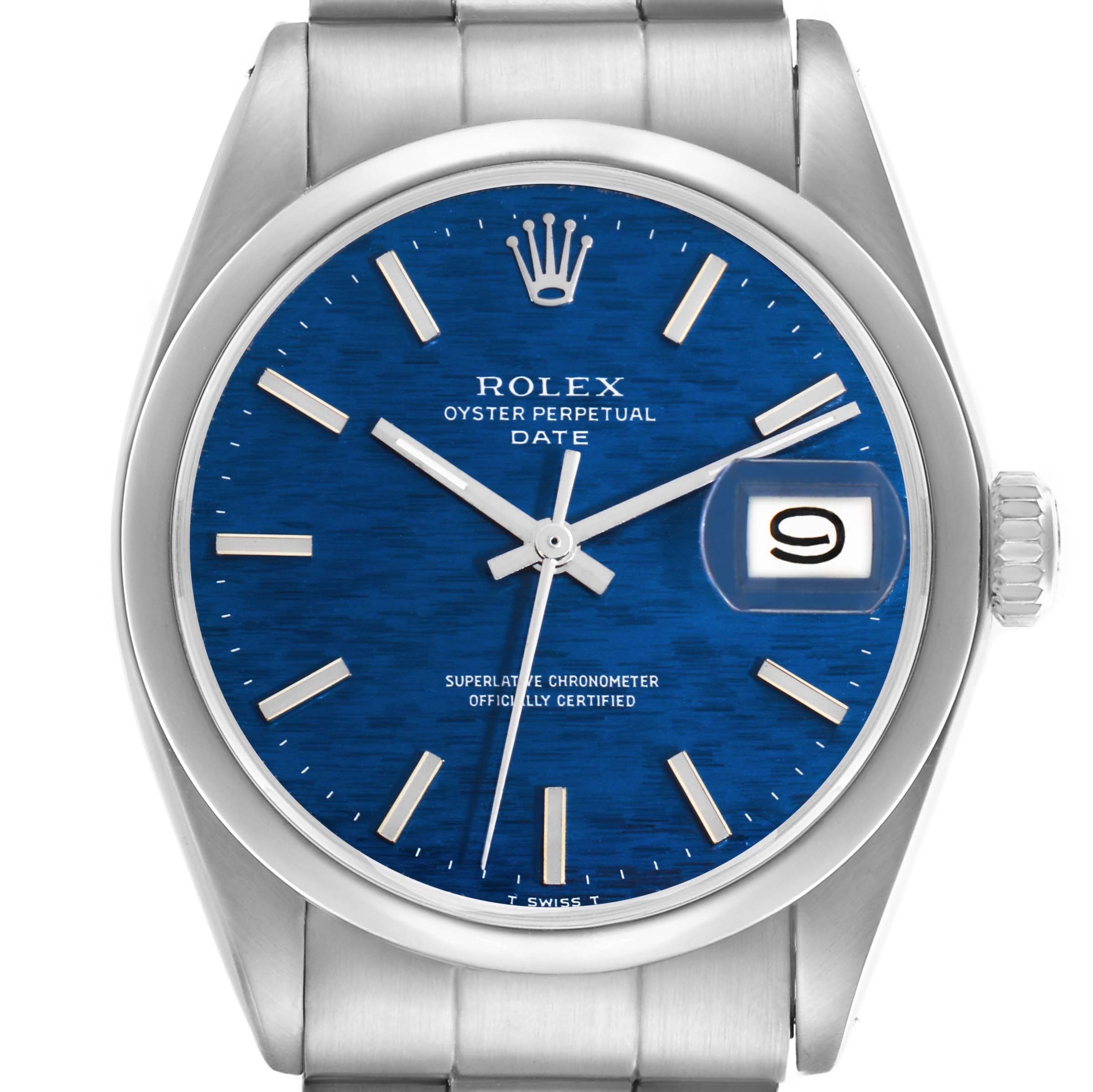 The Rolex Date watch is shown from the front, highlighting the blue dial, indices, hands, date window, and part of the bracelet.