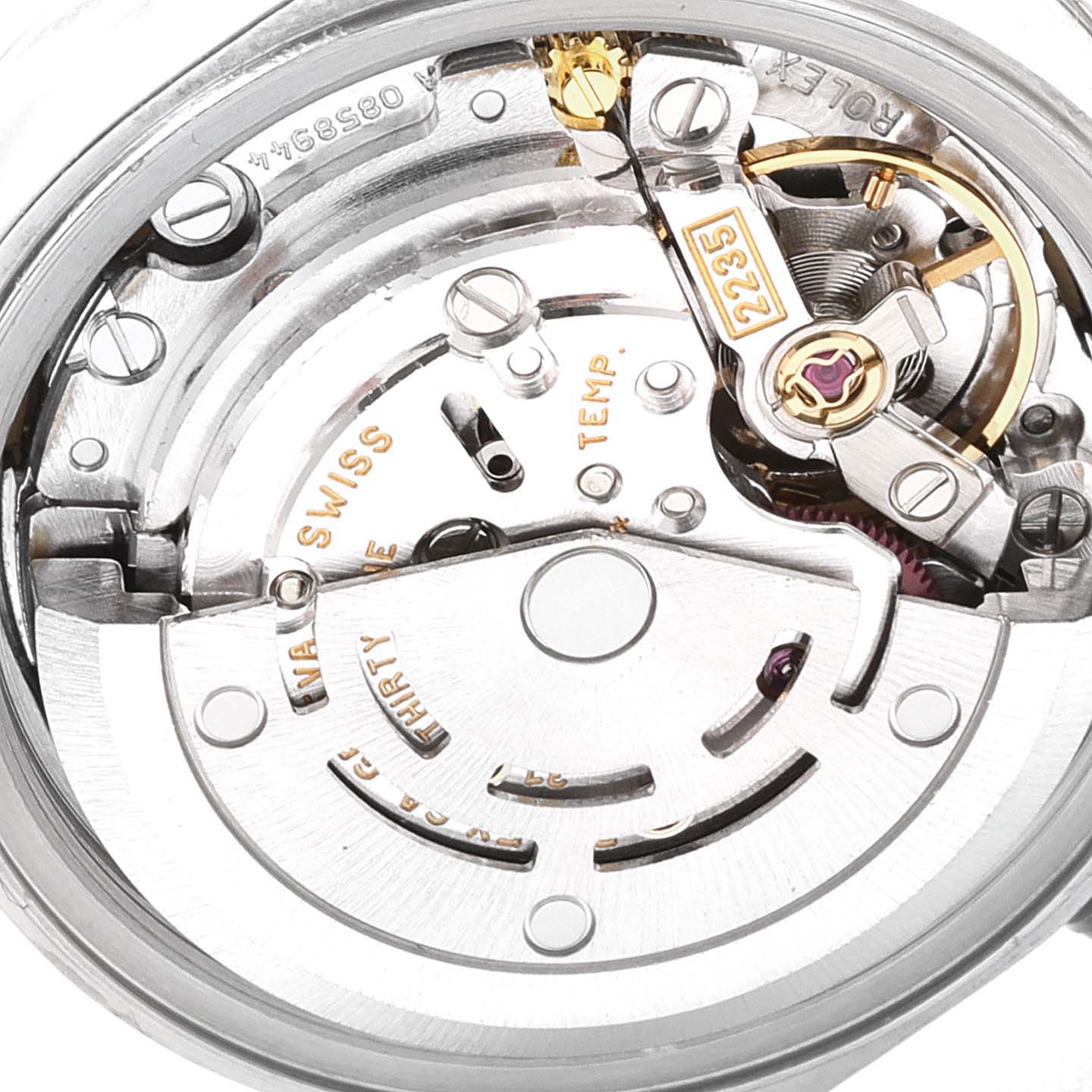 The image shows a close-up view of the movement mechanism inside a Rolex Datejust 79174 Women
s Stainless Steel Blue Dial 79174 Women
s Stainless Steel Blue Dial watch.