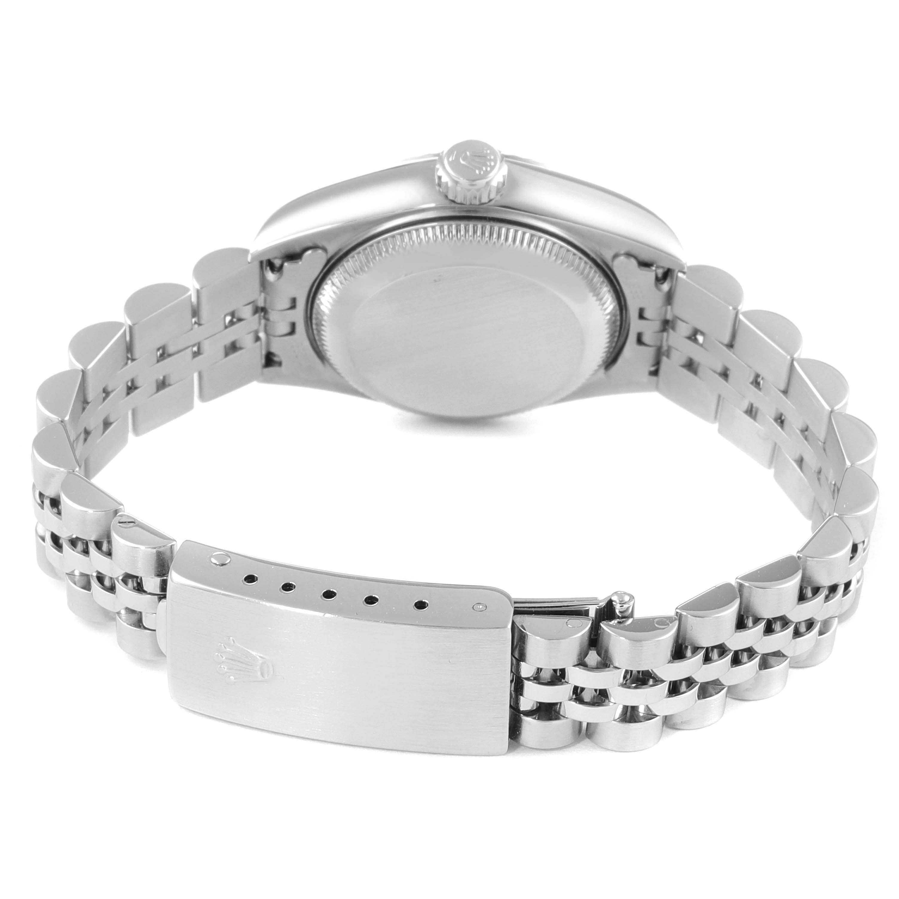 The image shows the back case and bracelet clasp of a Rolex Datejust 79174 Women
s Stainless Steel Blue Dial 79174 Women
s Stainless Steel Blue Dial watch, viewed from the rear.