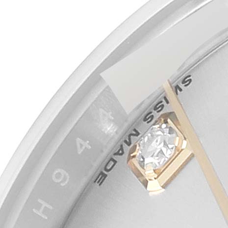 The image shows a close-up angle of the Rolex Datejust 179173 Women's Steel and Gold (two tone) Silver Dial 179173 Women's Steel and Gold (two tone) Silver Dial watch dial, highlighting the diamond hour marker and "Swiss Made" text.