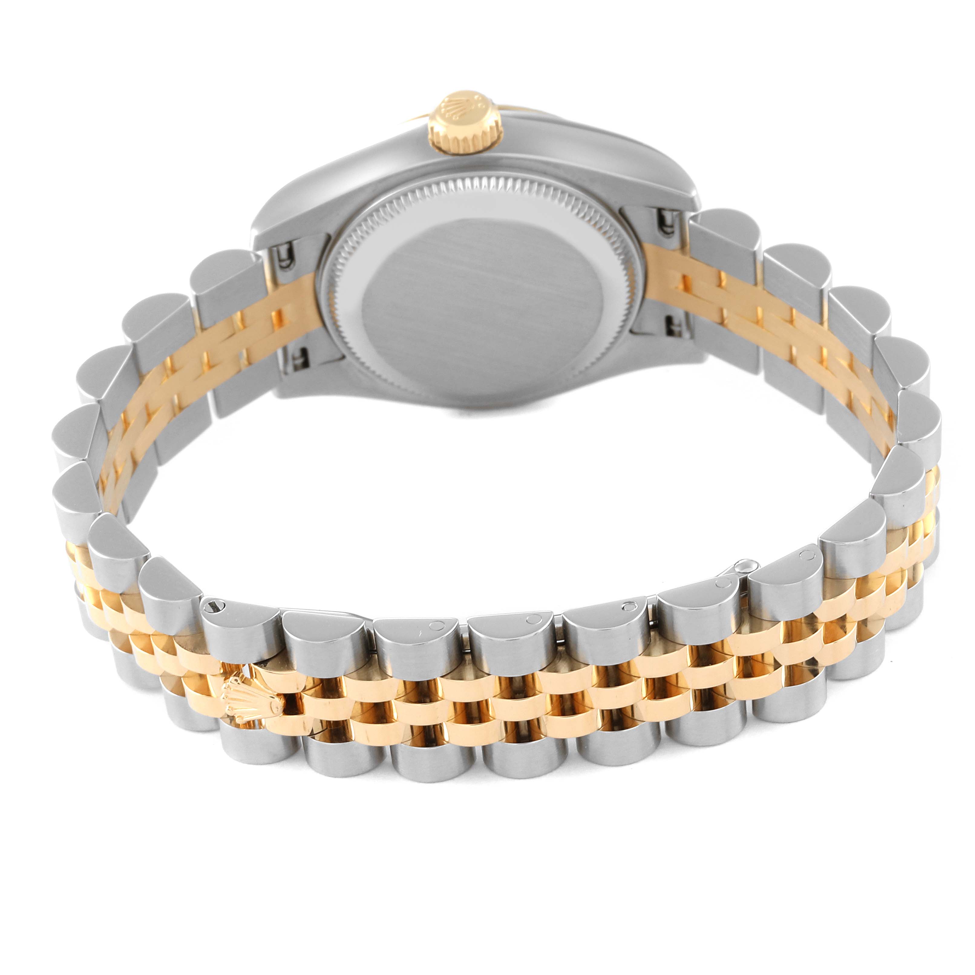 This image shows the back and bracelet of a Rolex Datejust 179173 Women's Steel and Gold (two tone) Silver Dial 179173 Women's Steel and Gold (two tone) Silver Dial watch with a two-tone metal design.