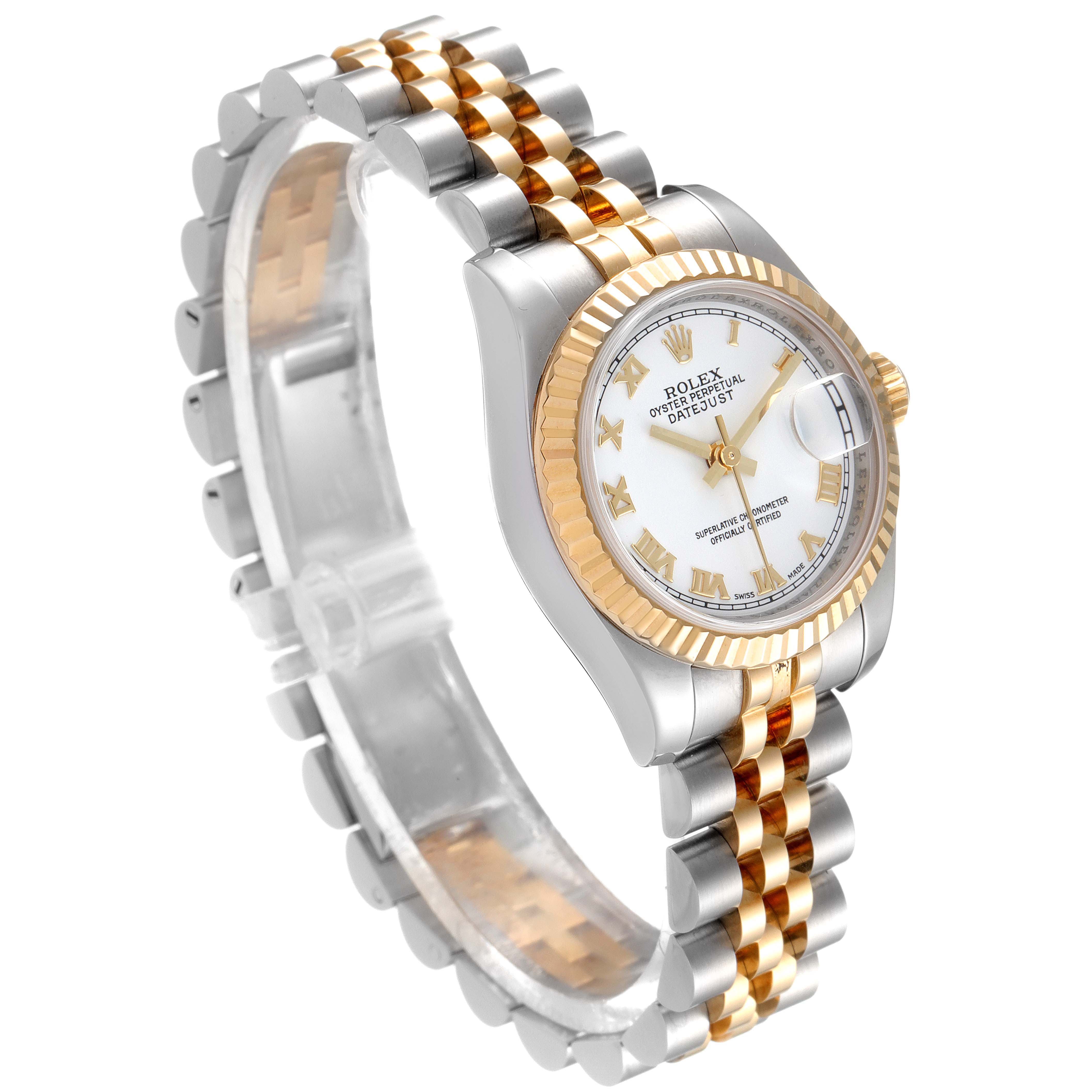 The image shows a Rolex Datejust 179173 Women
s Steel and Gold (two tone) White Dial 179173 Women
s Steel and Gold (two tone) White Dial watch at an angled view, highlighting its two-tone bracelet and fluted bezel.
