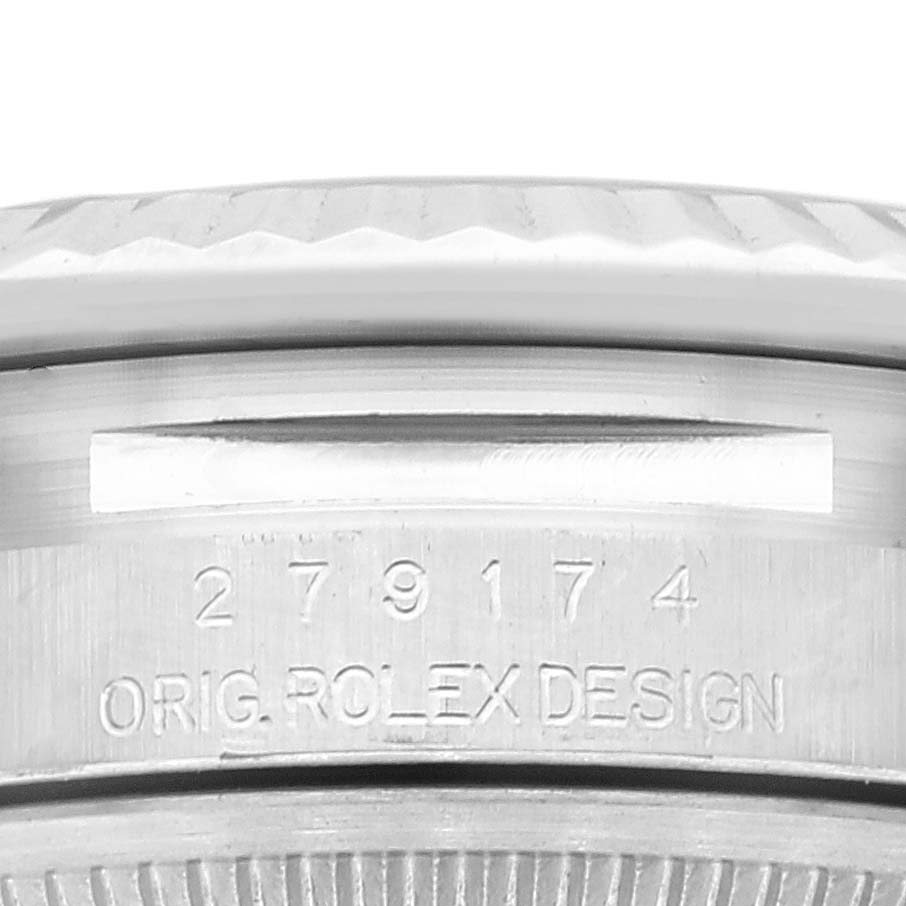 This image shows a close-up side view of the case back with serial number and "ORIG. ROLEX DESIGN" engraved on a Rolex Datejust 279174 Women's Stainless Steel White Dial 279174 Women's Stainless Steel White Dial.
