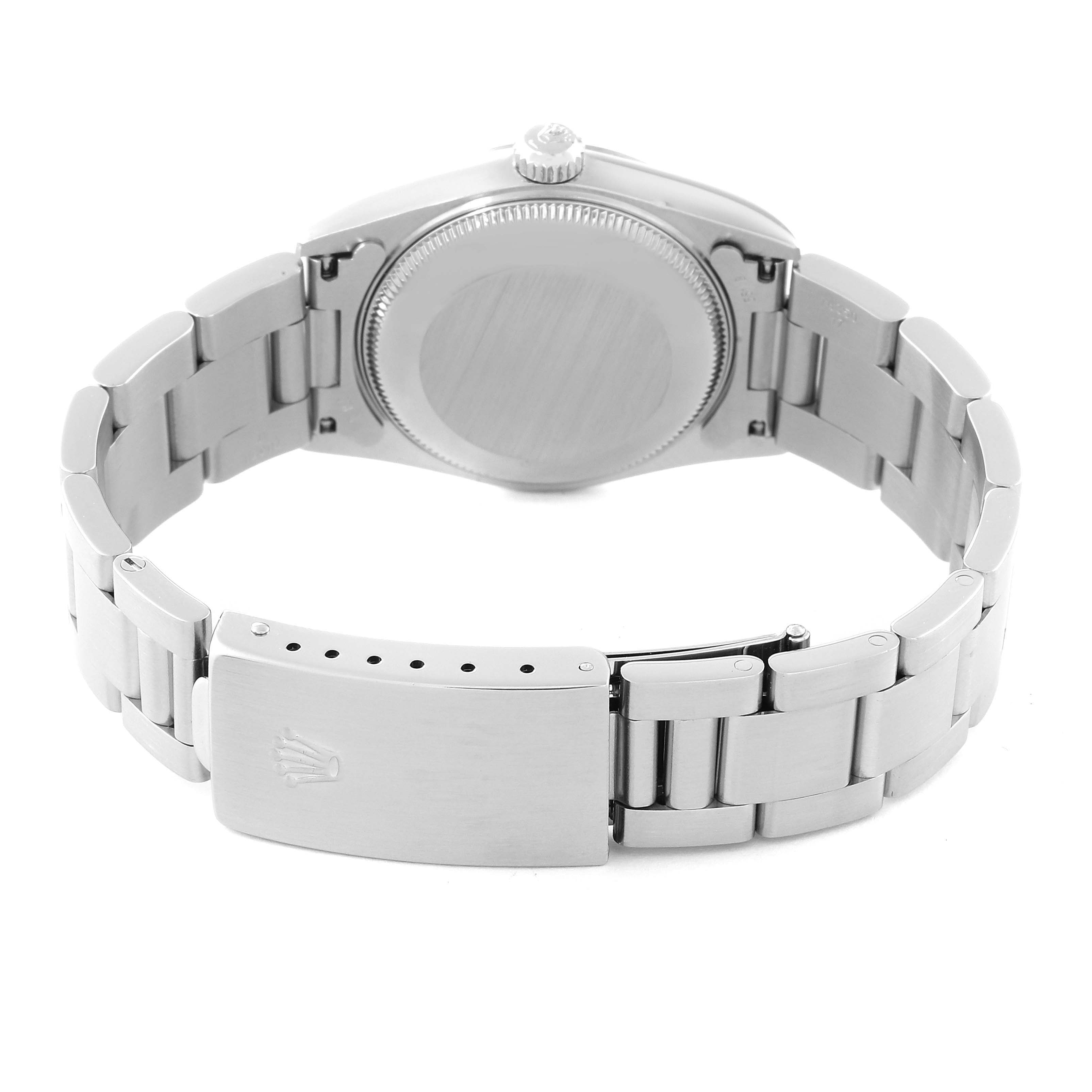 This image shows the back of a Rolex Datejust 78240 Women's Stainless Steel Pink Dial 78240 Women's Stainless Steel Pink Dial watch, featuring the case back, bracelet, and clasp.