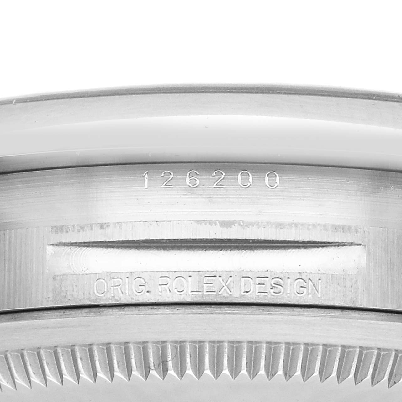 The image shows a close-up of the side of a Rolex Datejust 126200 Men's Stainless Steel Blue Dial 126200 Men's Stainless Steel Blue Dial, highlighting the model number and "ORIG. ROLEX DESIGN" engraving.