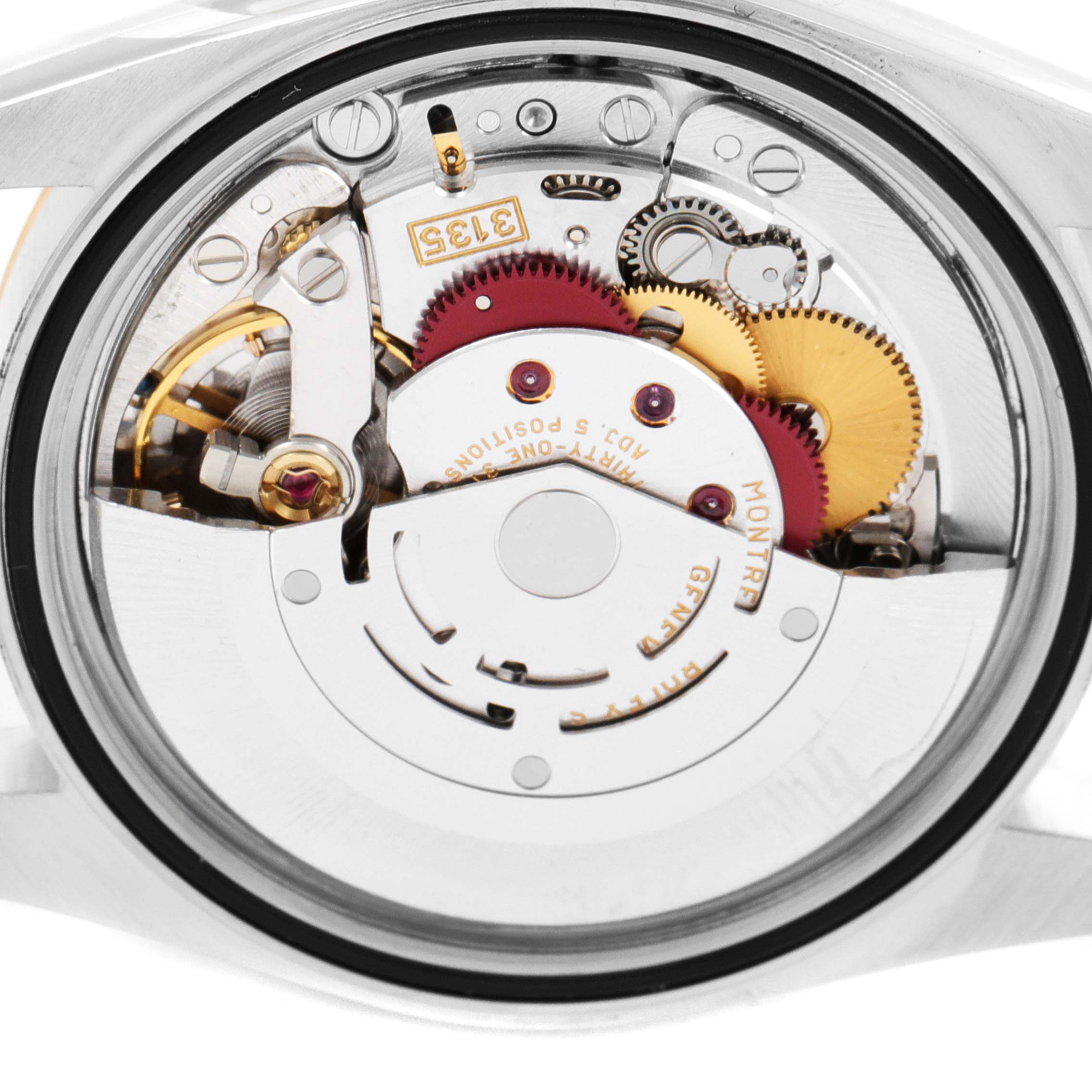 This image shows the inner movement of a Rolex Datejust 16203 Men
s Steel and Gold (two tone) Grey Dial 16203 Men
s Steel and Gold (two tone) Grey Dial watch, viewed from the back.