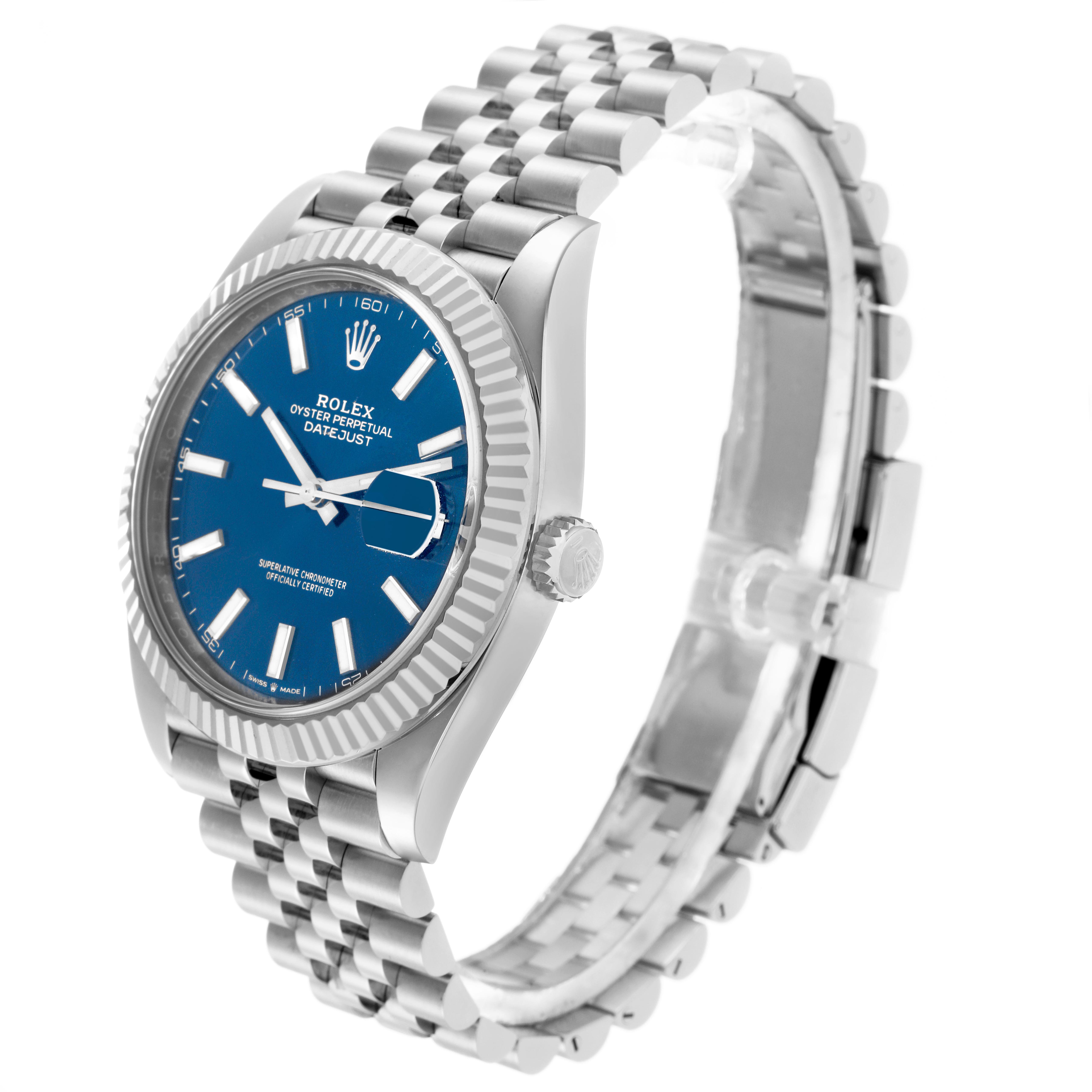 The Rolex Datejust 41 126334 Men's Stainless Steel Blue Dial 126334 Men's Stainless Steel Blue Dial watch is shown from a three-quarter angle, displaying the dial, fluted bezel, crown, and bracelet.