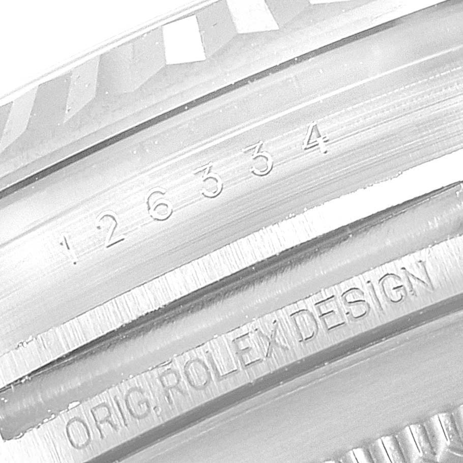 This close-up image shows the engraved model number and "ORIG. ROLEX DESIGN" on the Datejust 41 by Rolex.