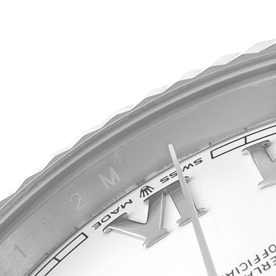 This image shows a close-up of the dial and the edge of the bezel on a Rolex Datejust 41 126334 Men
s Stainless Steel White Dial 126334 Men
s Stainless Steel White Dial watch.