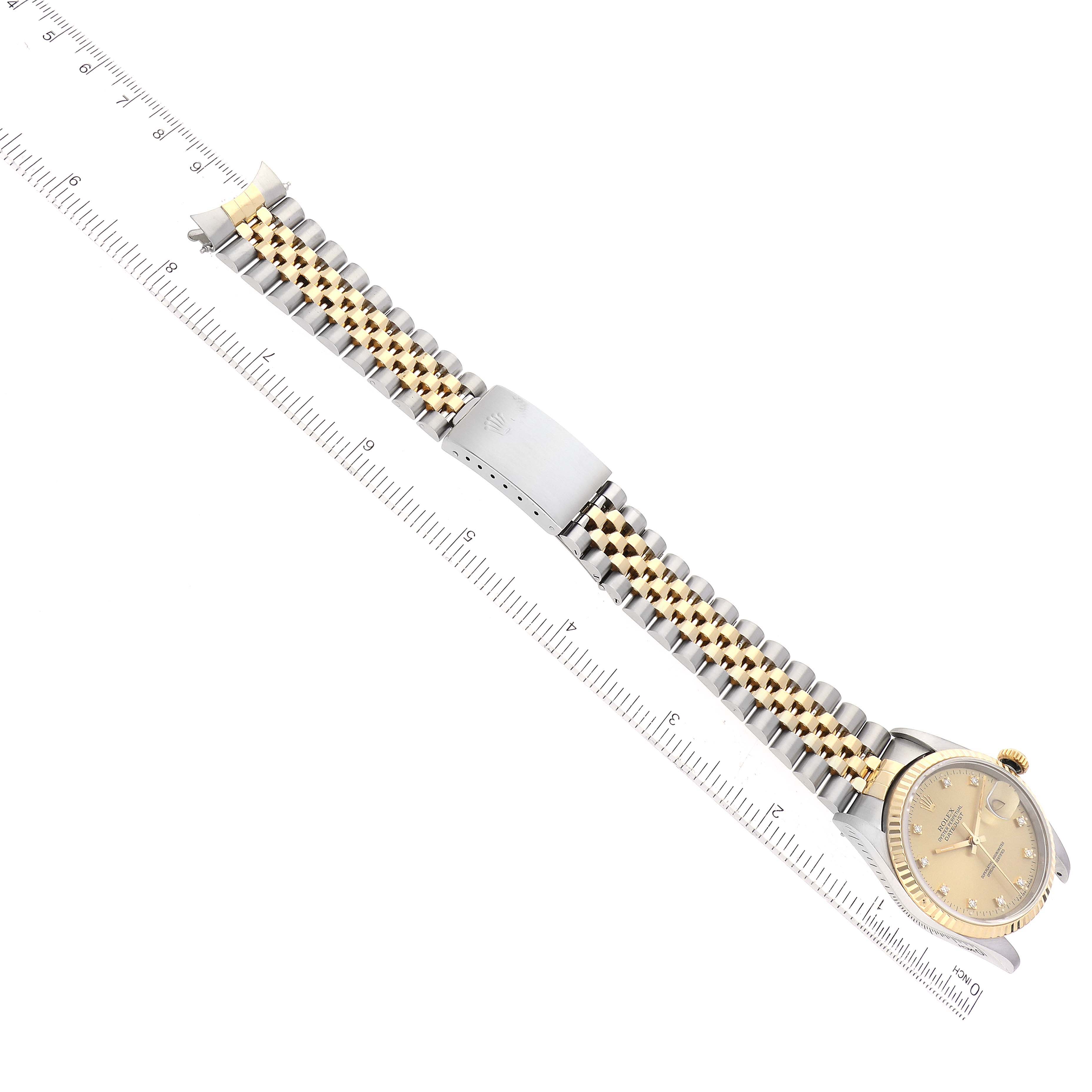 The Rolex Datejust 16233 Men's Steel and Gold (two tone) Champagne Dial 16233 Men's Steel and Gold (two tone) Champagne Dial watch is shown from a top-down angle, displaying the entire bracelet, clasp, and dial.