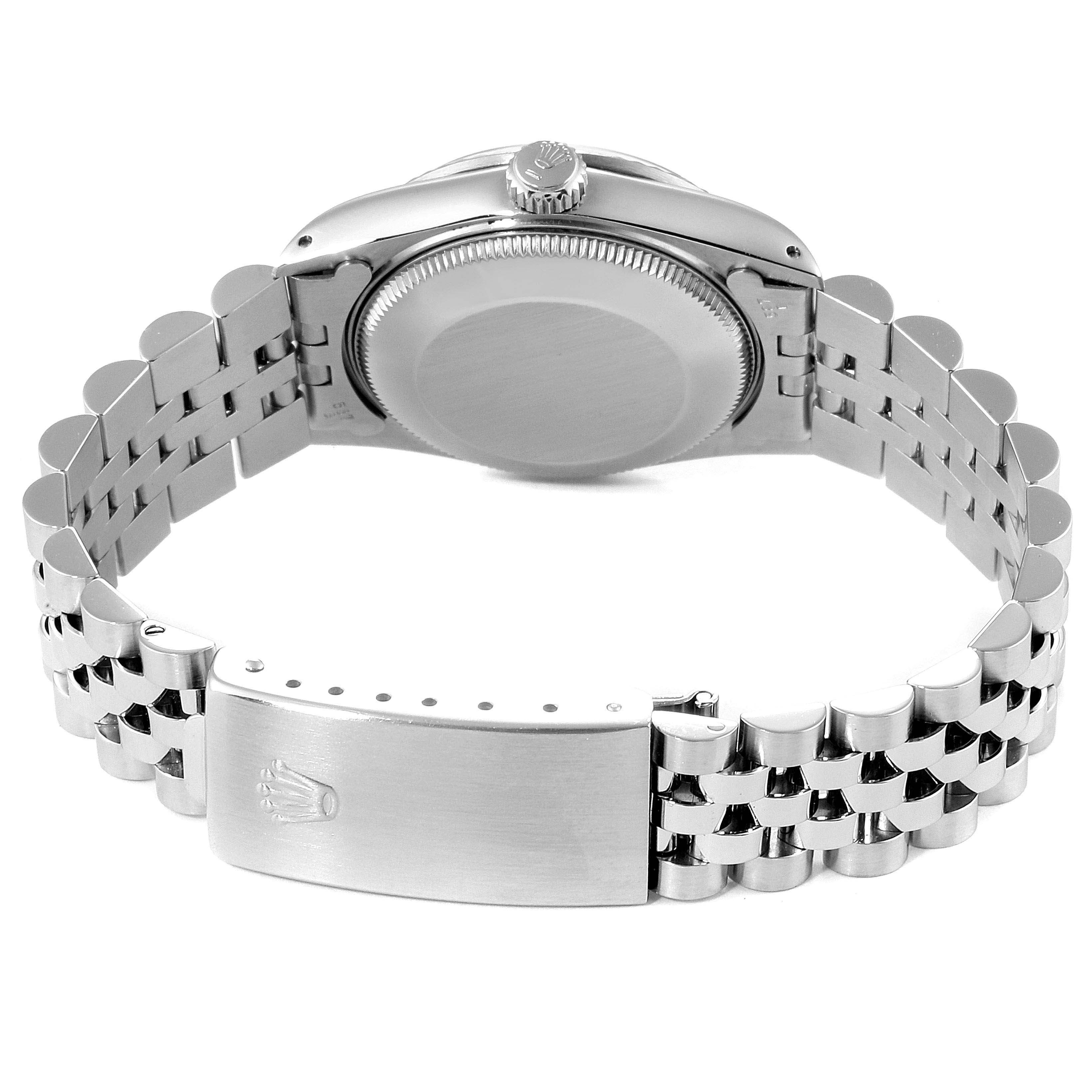 This is a rear view of a Rolex Mid-Size 68274 Women
s Stainless Steel Silver Dial 68274 Women
s Stainless Steel Silver Dial model, showing the watch
s case back and metal bracelet with clasp.