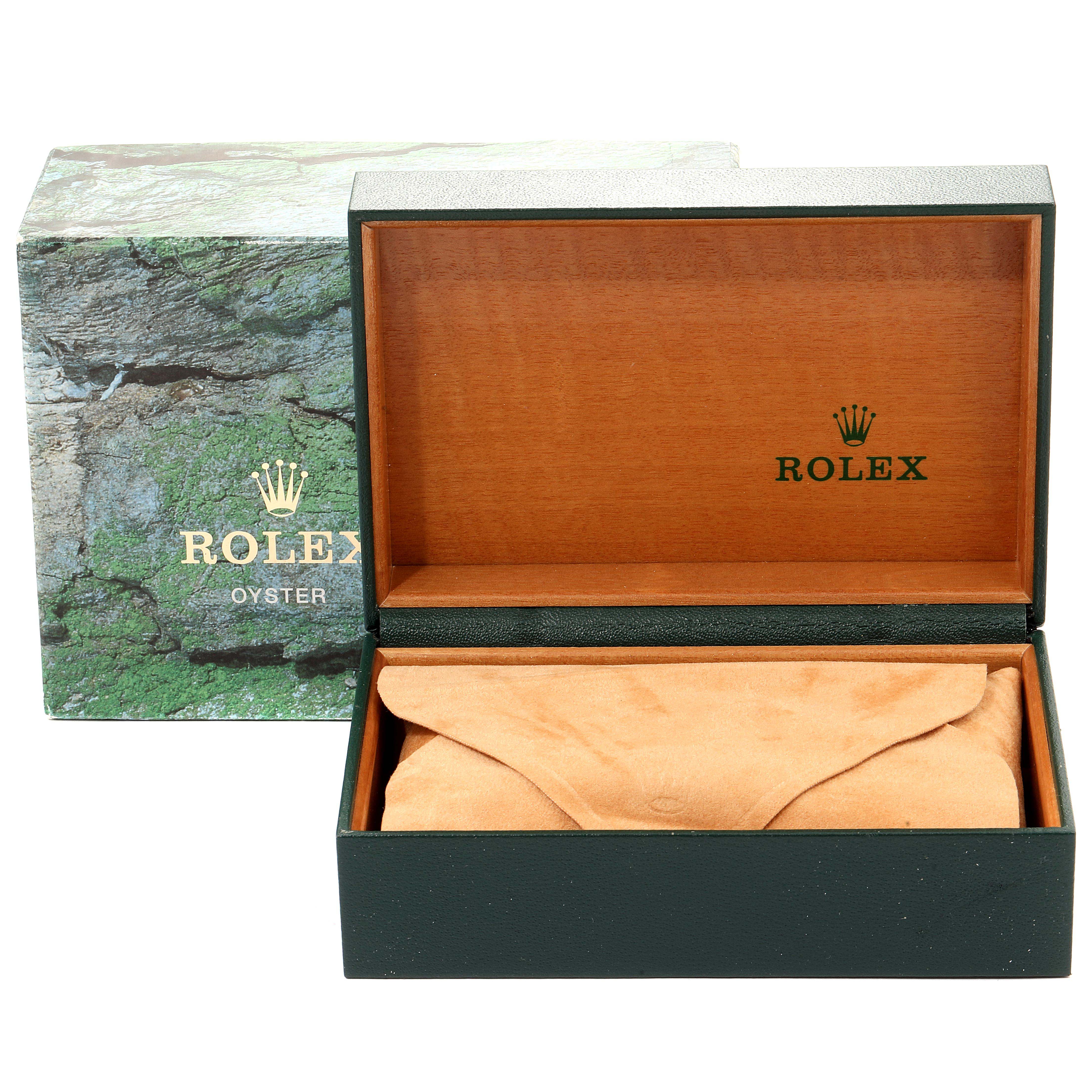 The image shows a Rolex Mid-Size 68273 Women
s Steel and Gold (two tone) Silver Dial 68273 Women
s Steel and Gold (two tone) Silver Dial model watch box and packaging, with the box open to reveal a suede pouch inside.
