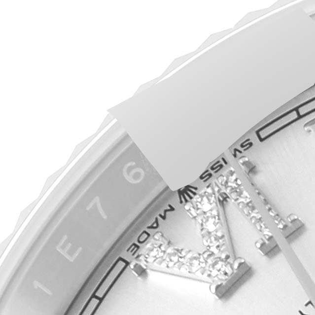 Close-up of the Rolex Datejust 126234 Men's Stainless Steel Silver Dial 126234 Men's Stainless Steel Silver Dial watch dial showing diamond-studded index, date just feature, and part of "SWISS MADE" text.