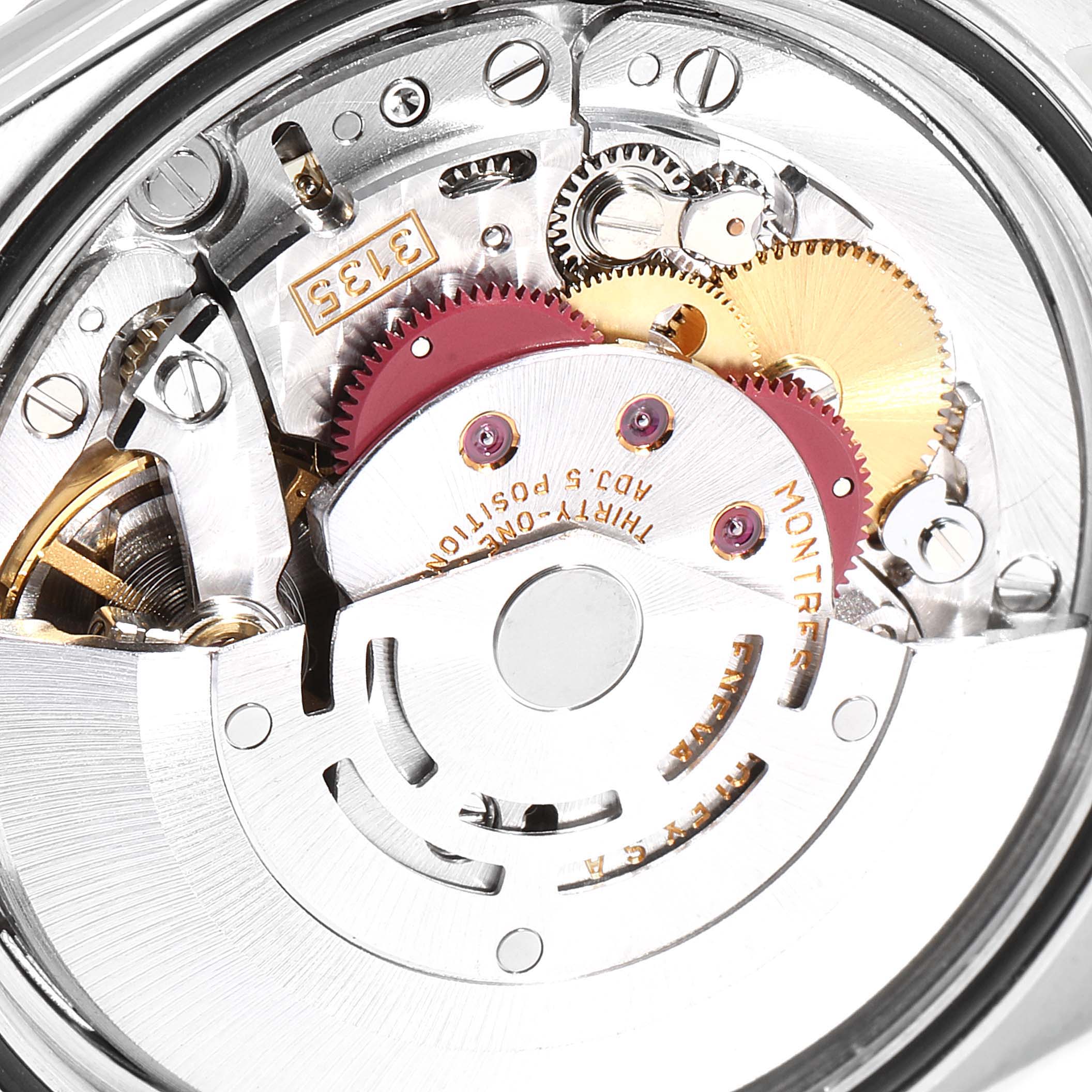 The image shows a close-up view of the internal movement of a Rolex Datejust 16234 Men's Stainless Steel Silver Dial 16234 Men's Stainless Steel Silver Dial watch, highlighting its gears and mechanisms.