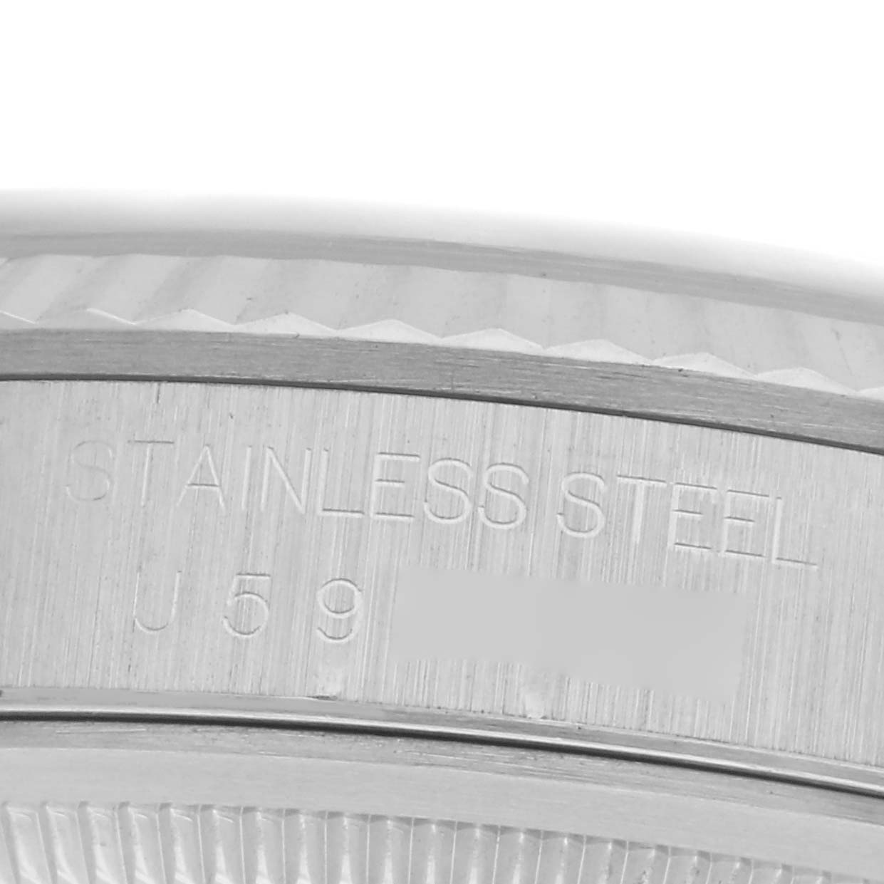 The image shows a close-up of the case back of a Rolex Datejust 16234 Men's Stainless Steel Silver Dial 16234 Men's Stainless Steel Silver Dial, highlighting the stainless steel engraving.