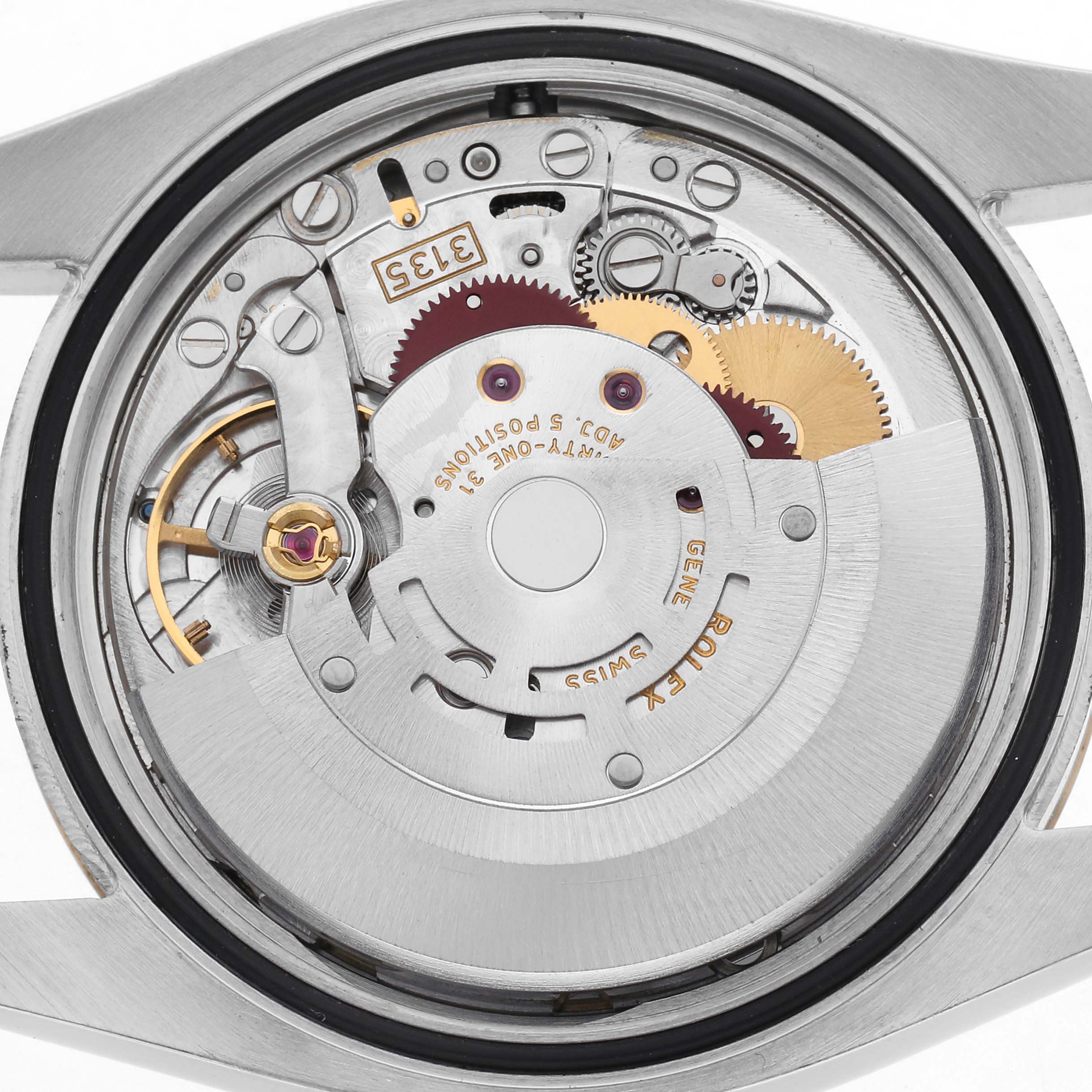 The image shows the back view of a Rolex Datejust 116233 Men's Steel and Gold (two tone) Champagne Dial 116233 Men's Steel and Gold (two tone) Champagne Dial movement, highlighting gears and mechanical components.