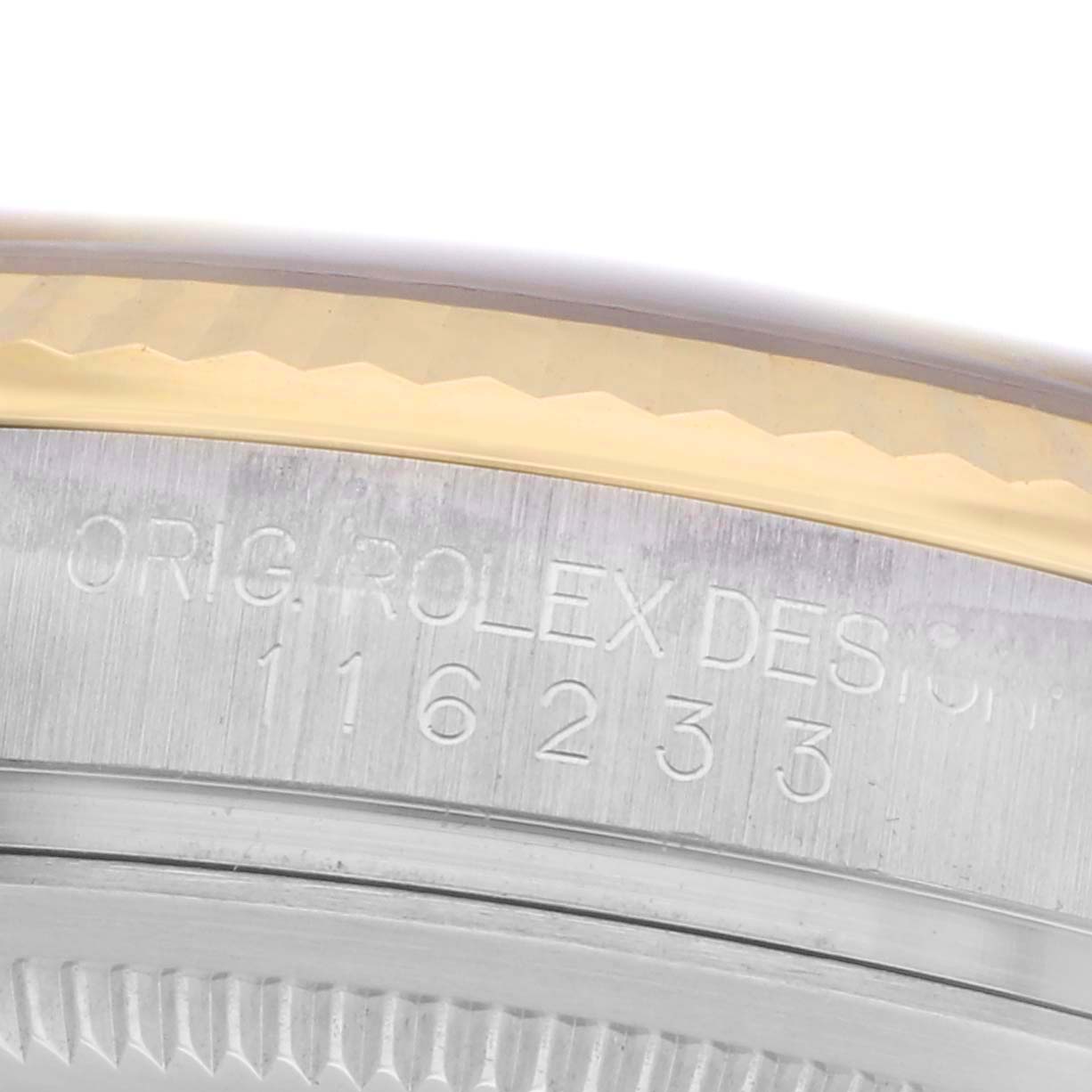 The image shows the side engraving on the bezel of a Rolex Datejust 116233 Men's Steel and Gold (two tone) Champagne Dial 116233 Men's Steel and Gold (two tone) Champagne Dial watch, highlighting the model number.