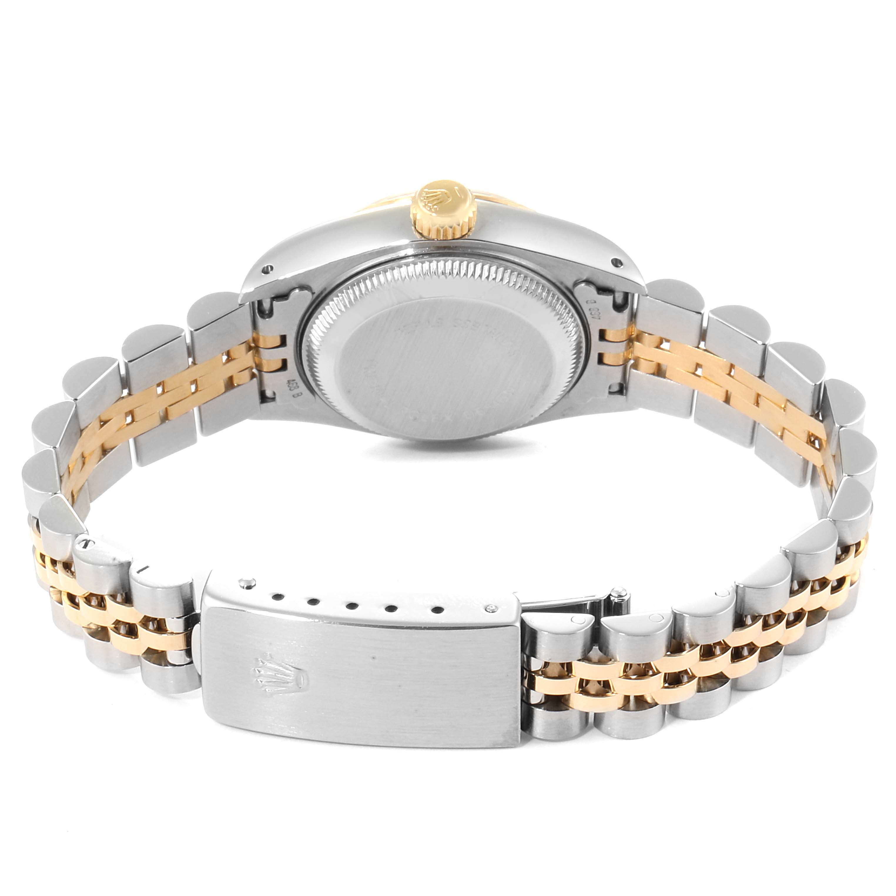 Rear view of a Rolex Datejust 69173  Women
s Steel and Gold (two tone) Champagne Dial 69173  Women
s Steel and Gold (two tone) Champagne Dial watch showing the closed clasp, case back, and two-tone bracelet.