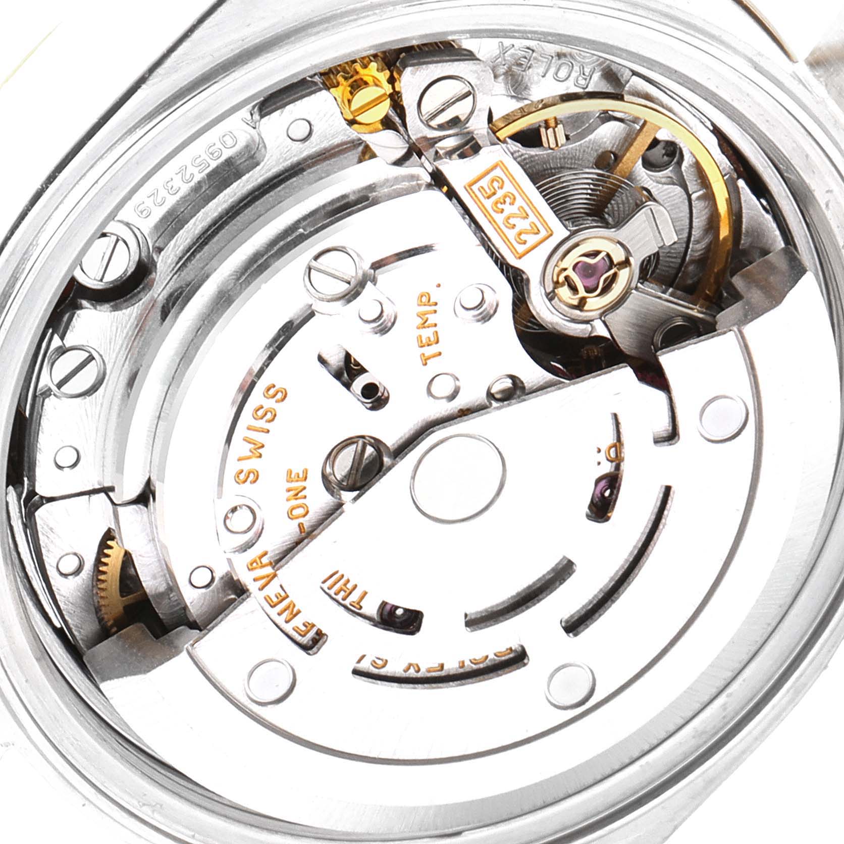 The image shows the internal mechanical movement of a Rolex Datejust 79173 Women
s Steel and Gold (two tone) Red Dial 79173 Women
s Steel and Gold (two tone) Red Dial watch from a close-up angle.