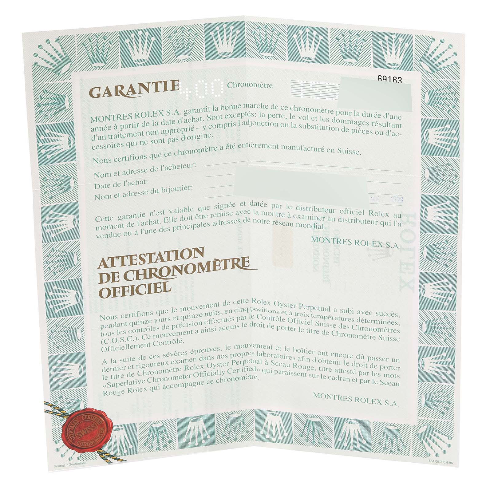 The image shows a close-up of a Rolex Datejust 69163 Women's Steel and Gold (two tone) Grey Dial 69163 Women's Steel and Gold (two tone) Grey Dial warranty certificate and chronometer attestation.