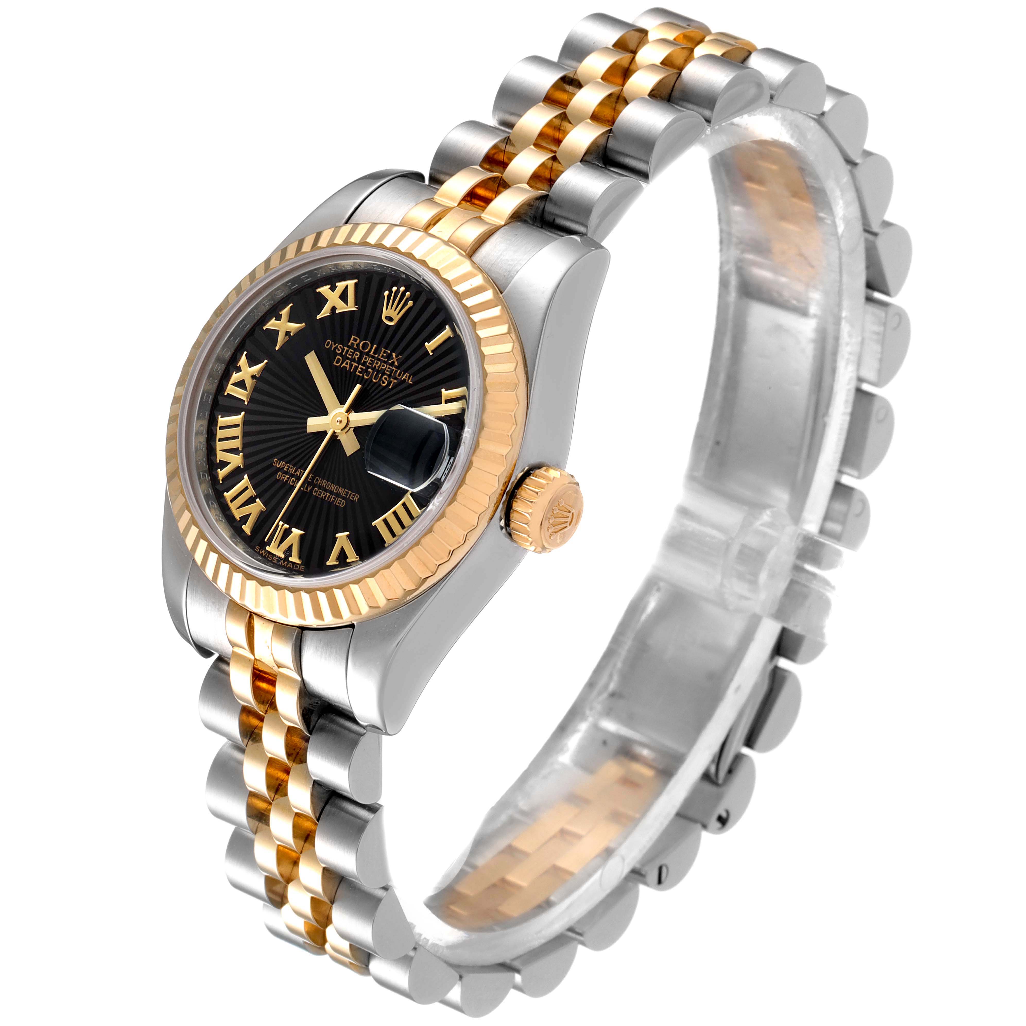 The image shows a Rolex Datejust 179173 Women
s Steel and Gold (two tone) Black Dial 179173 Women
s Steel and Gold (two tone) Black Dial watch angled to display its black dial, fluted bezel, crown, and two-tone jubilee bracelet.
