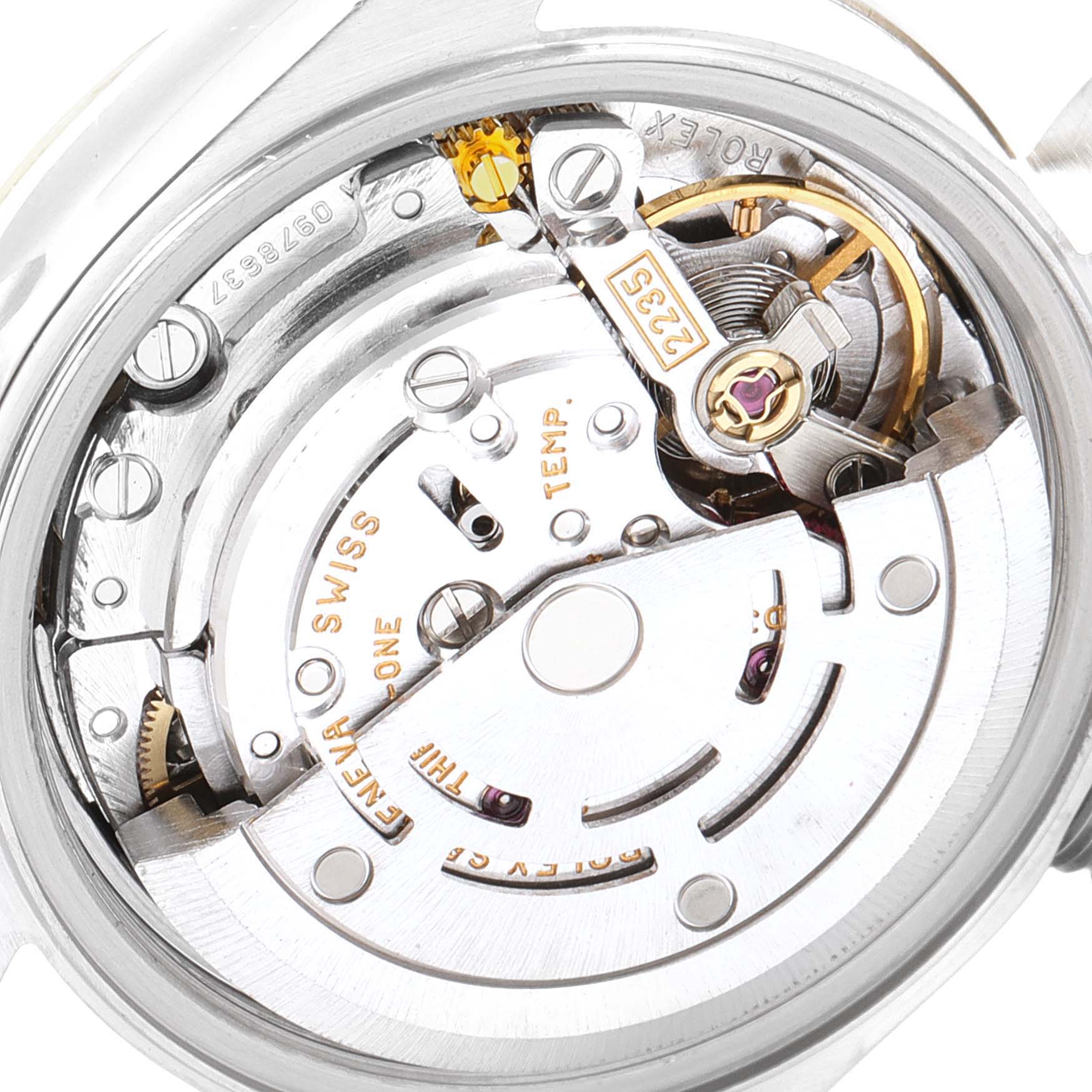 This image shows the intricate movement mechanism of a Rolex Datejust 79163 Women's Steel and Gold (two tone) White Dial 79163 Women's Steel and Gold (two tone) White Dial model's watch from a close-up angle.