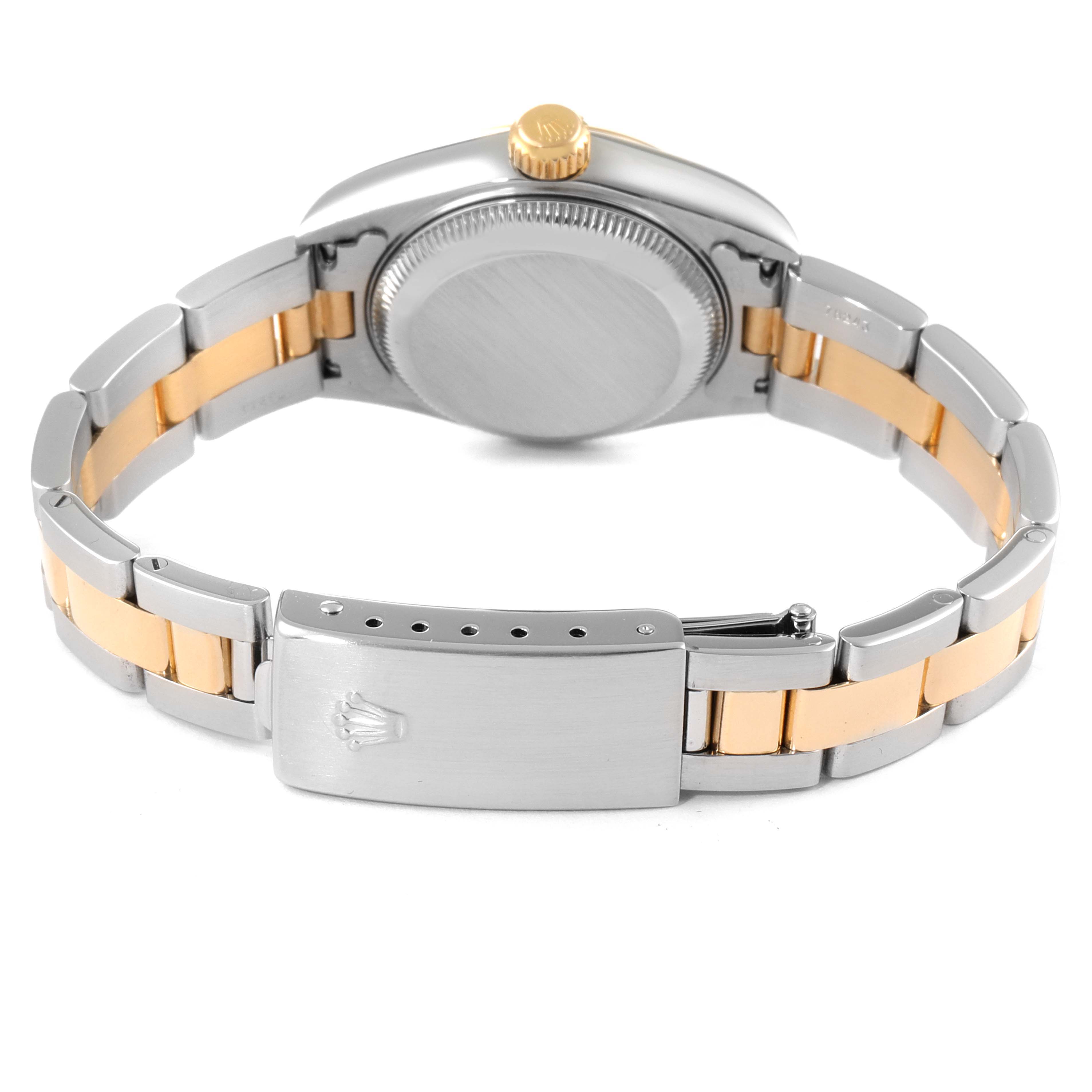 This image shows the back view of a Rolex Datejust 79163 Women's Steel and Gold (two tone) White Dial 79163 Women's Steel and Gold (two tone) White Dial watch, highlighting the two-tone bracelet and the clasp featuring the Rolex logo.