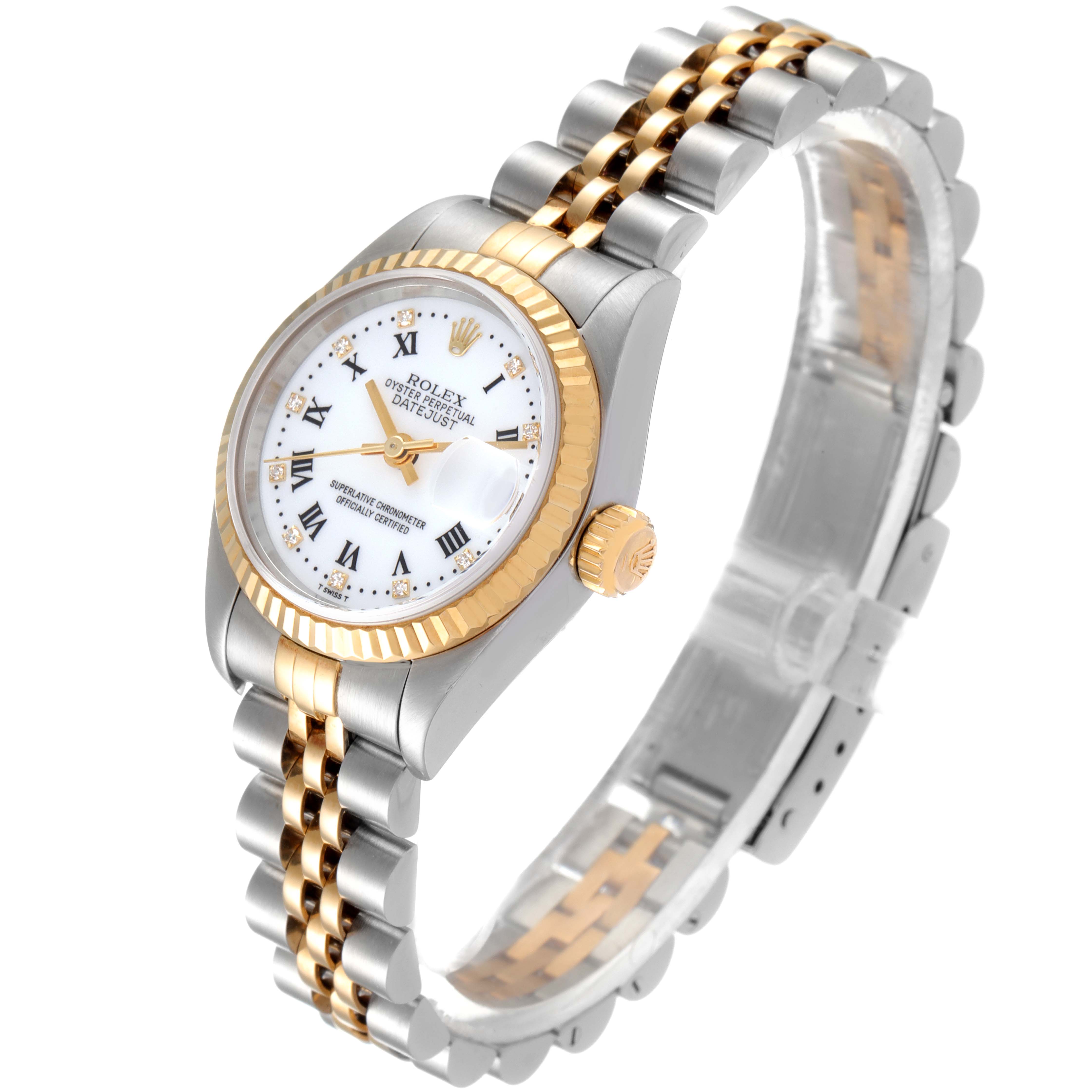 The Rolex Datejust 79173 Women
s Steel and Gold (two tone) White Dial 79173 Women
s Steel and Gold (two tone) White Dial watch is shown at an angle highlighting the dial, crown, and two-tone jubilee bracelet.