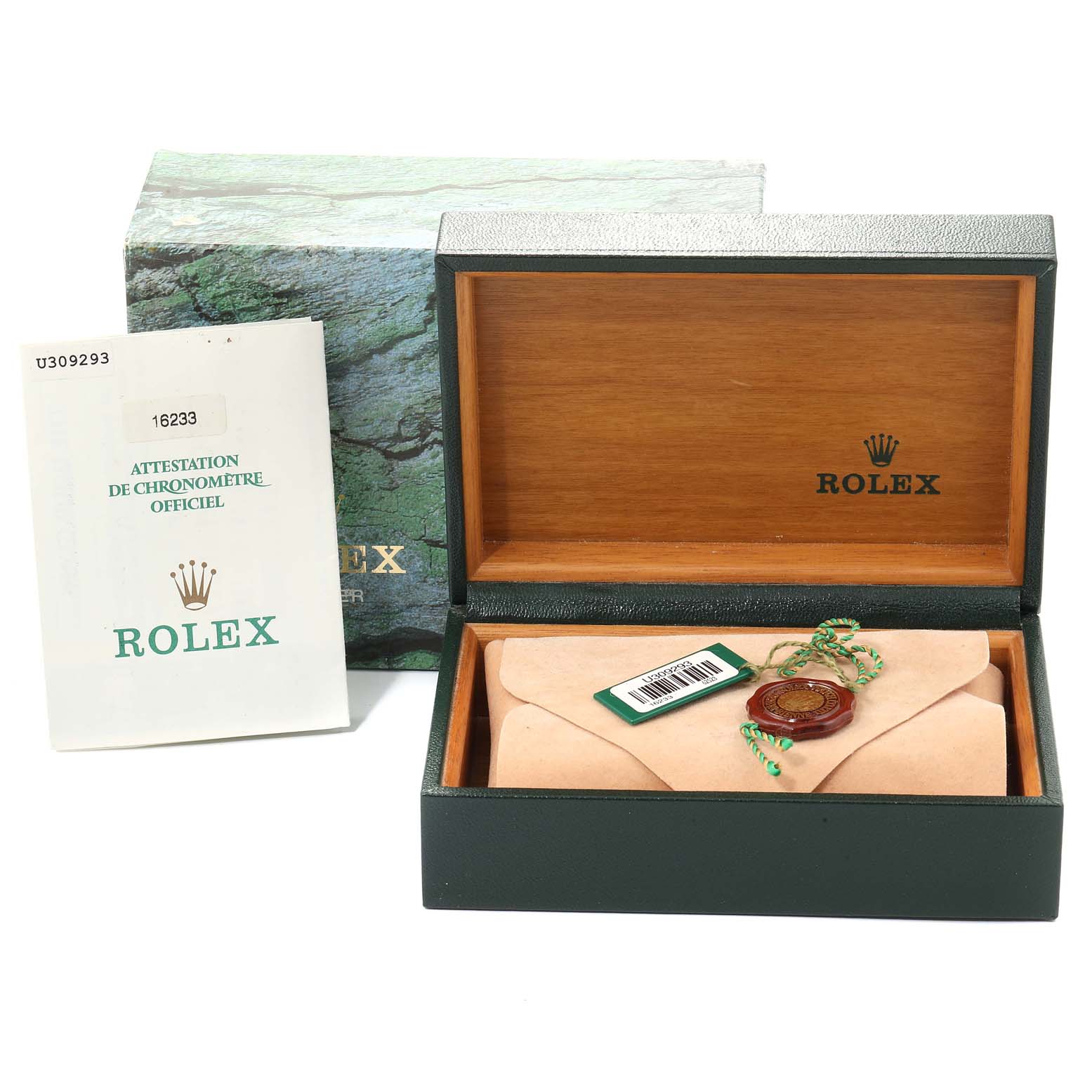 The image shows a Rolex Datejust 16233 Men's Steel and Gold (two tone) Champagne Dial 16233 Men's Steel and Gold (two tone) Champagne Dial box with its packaging, documentation, and a sealed watch pouch, viewed from the front.