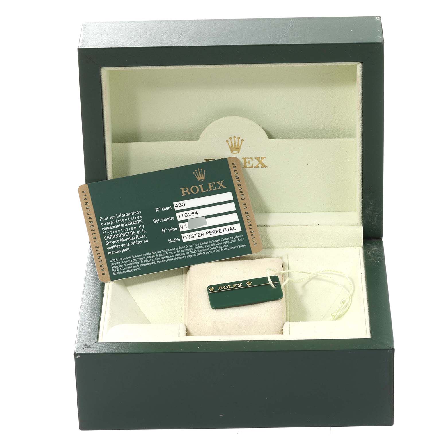 The image shows a Rolex Turn-o-Graph 116264 Men's Stainless Steel Black Dial 116264 Men's Stainless Steel Black Dial model box with the authenticity card and a tag inside.