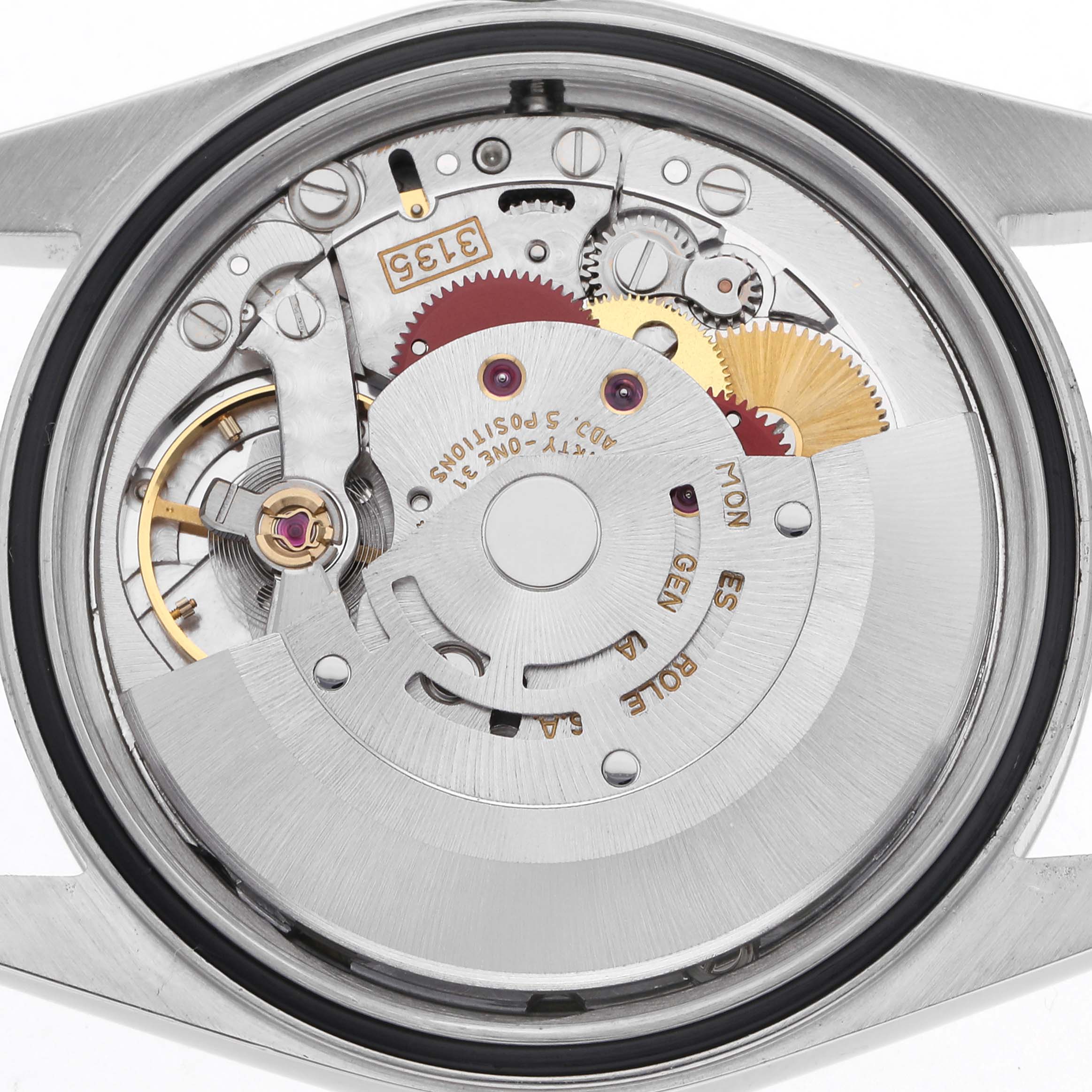 The image shows the movement of a Rolex Datejust 16220 Men's Stainless Steel White Dial 16220 Men's Stainless Steel White Dial, with gears and components visible from a back angle.
