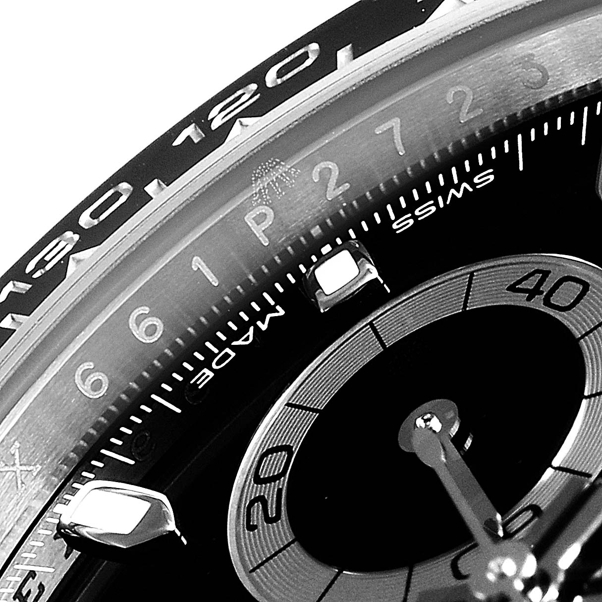 This is a close-up angle of a Rolex Daytona 116500 Men's Stainless Steel Black Dial 116500 Men's Stainless Steel Black Dial watch, showing part of the dial and bezel with numerals and markers.