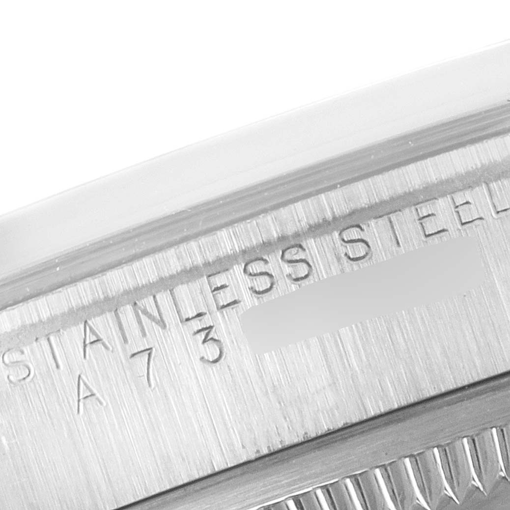 This close-up angle shows part of the stainless steel case with engravings of the Rolex Explorer 14270 Men's Stainless Steel Black Dial 14270 Men's Stainless Steel Black Dial model watch.