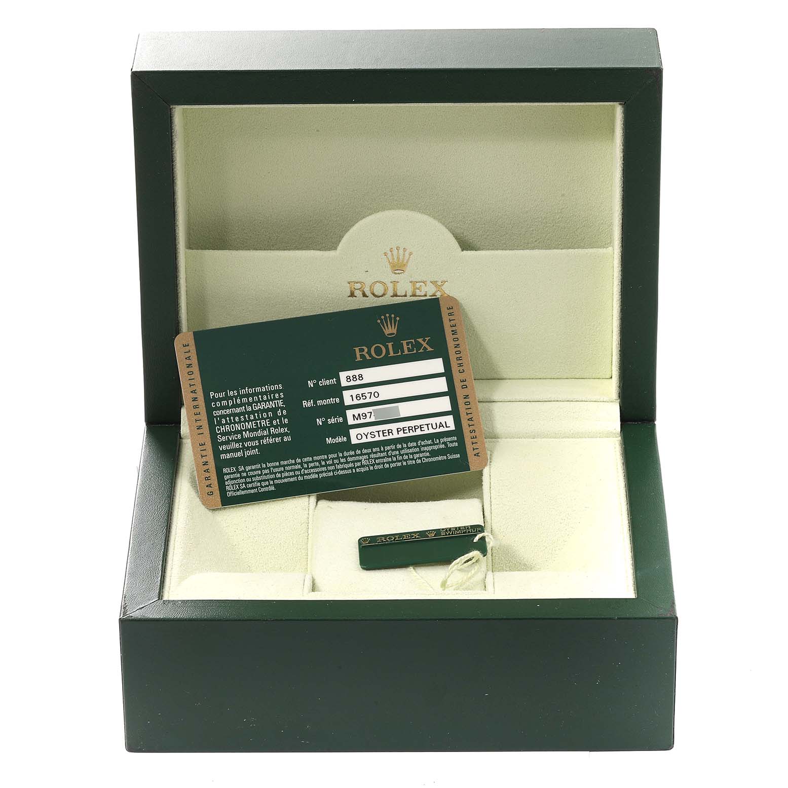 The image shows a green box in an open position displaying a Rolex Explorer 16570T Men's Stainless Steel Black Dial 16570T Men's Stainless Steel Black Dial watch card and a Rolex tag.