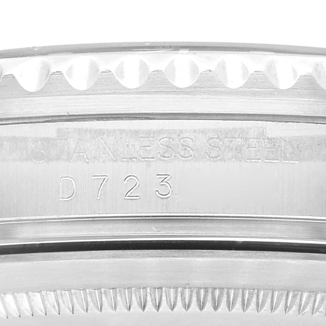 The image shows a close-up of the side of a Rolex GMT-Master 16710 Men
s Stainless Steel Black Dial 16710 Men
s Stainless Steel Black Dial watch, highlighting the stainless steel engraving and model number.