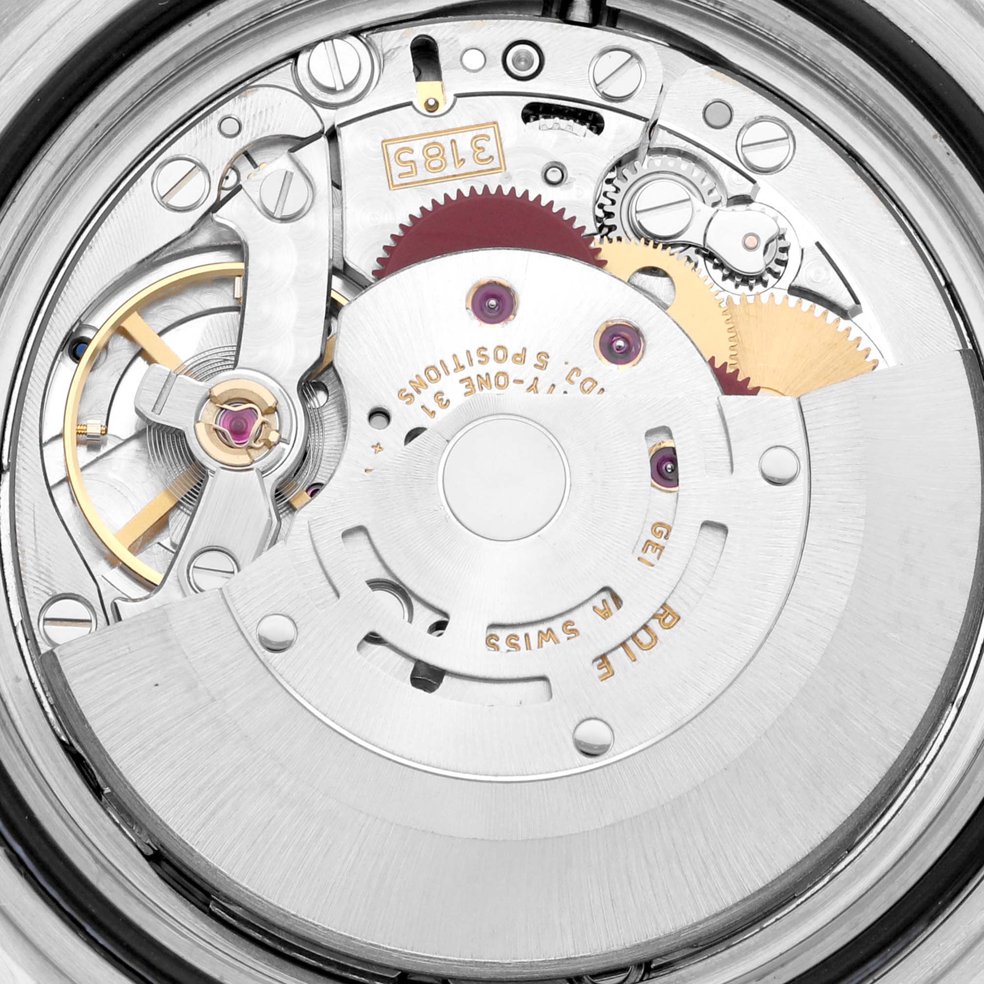 The image shows a close-up of the movement inside a Rolex GMT-Master 16710 Men's Stainless Steel Black Dial 16710 Men's Stainless Steel Black Dial watch, revealing the intricate mechanism and gears.