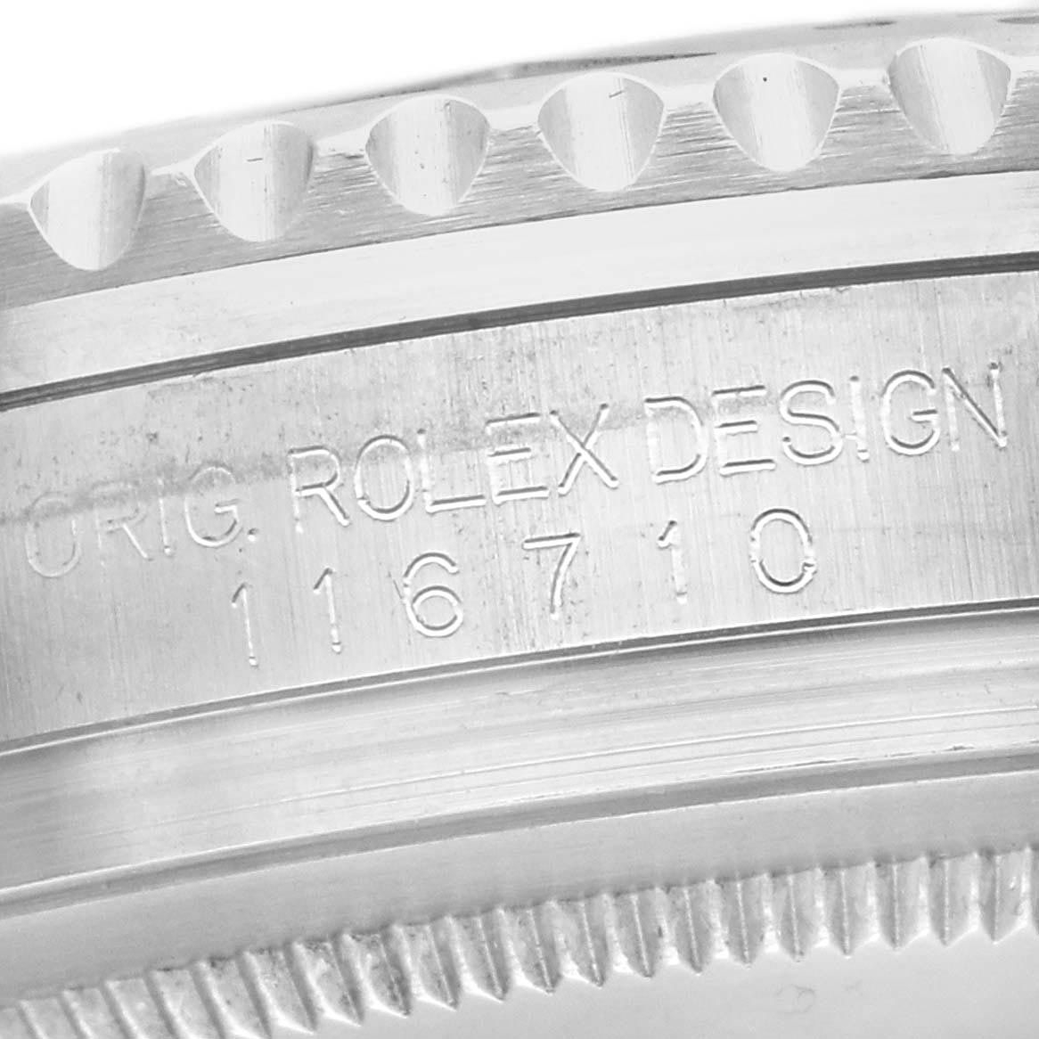 The image shows a close-up of the engraved case side of a Rolex GMT-Master 116710 Men's Stainless Steel Black Dial 116710 Men's Stainless Steel Black Dial, displaying the model number.