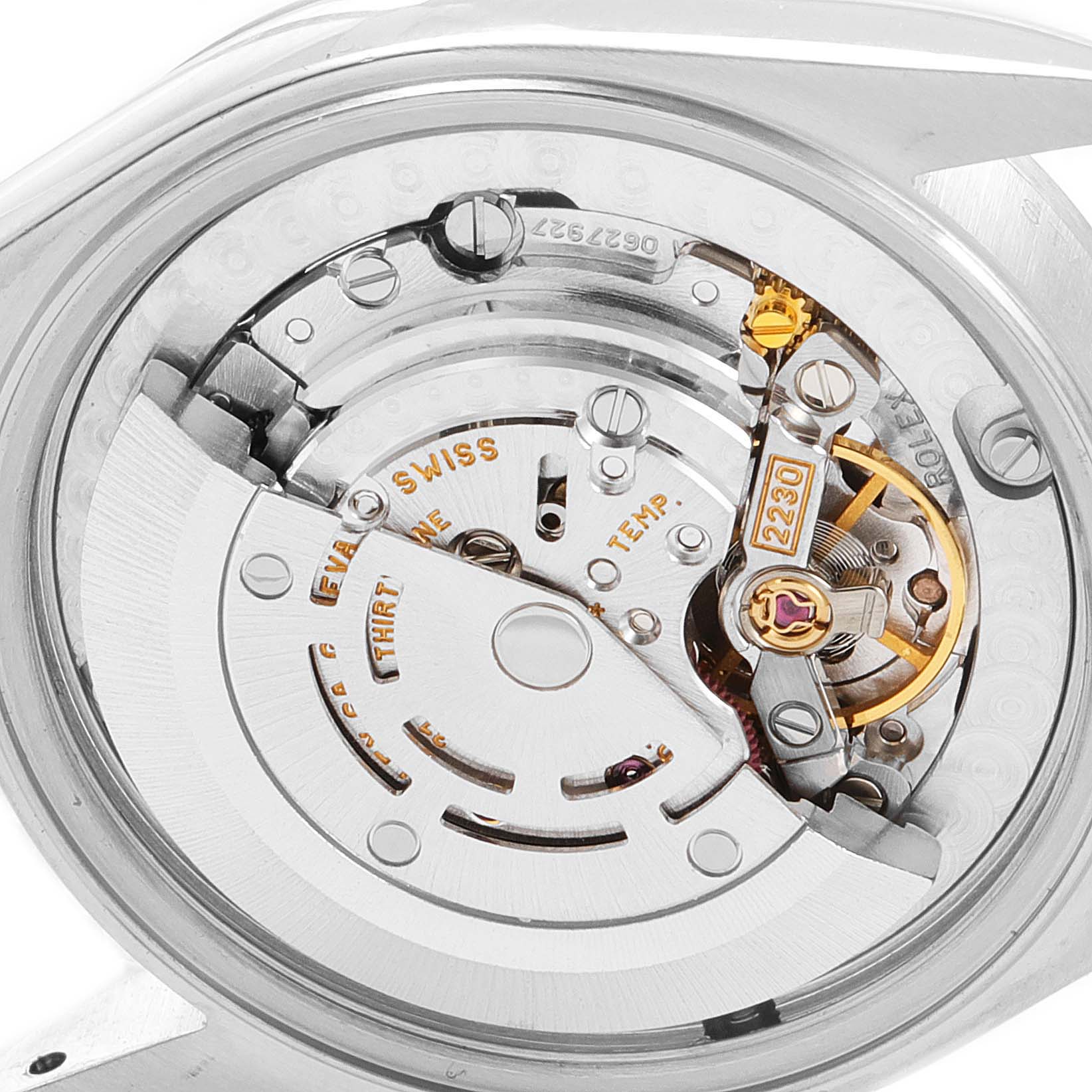 The image shows the movement mechanism of a Rolex Mid-Size 77080 Women
s Stainless Steel Pink Dial 77080 Women
s Stainless Steel Pink Dial model, viewed from the back.