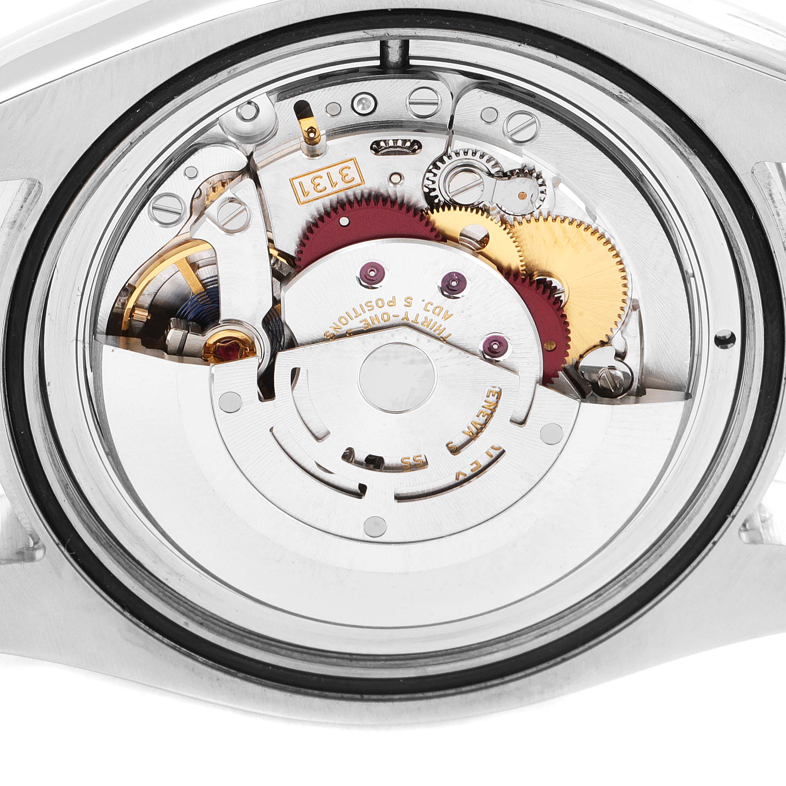 The image shows the internal mechanism of a Rolex Air-King 116900 Men's Stainless Steel Black Dial 116900 Men's Stainless Steel Black Dial watch viewed from the back.