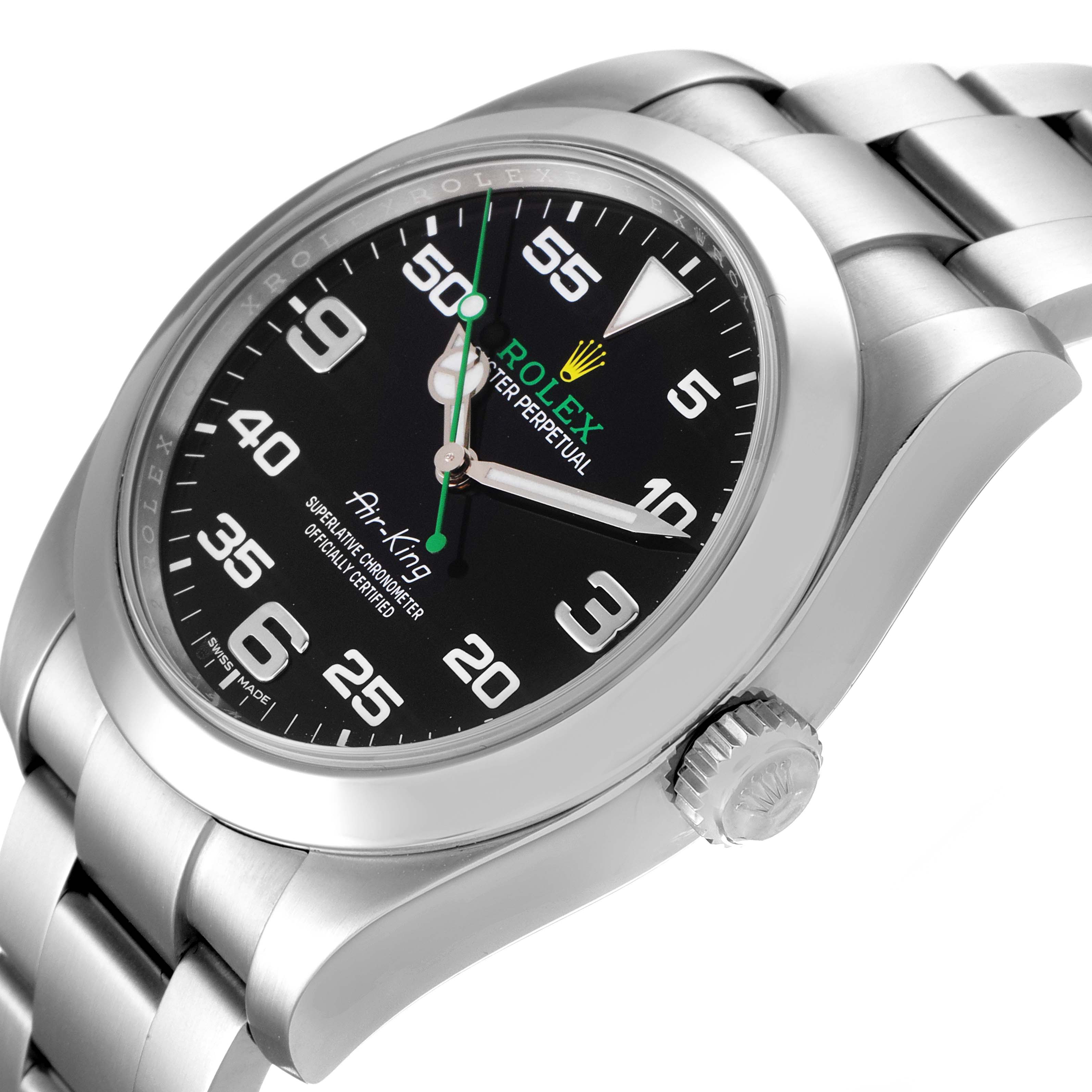 The Rolex Air-King 116900 Men's Stainless Steel Black Dial 116900 Men's Stainless Steel Black Dial watch is shown at an oblique angle, highlighting its black dial, crown, and part of the silver bracelet.