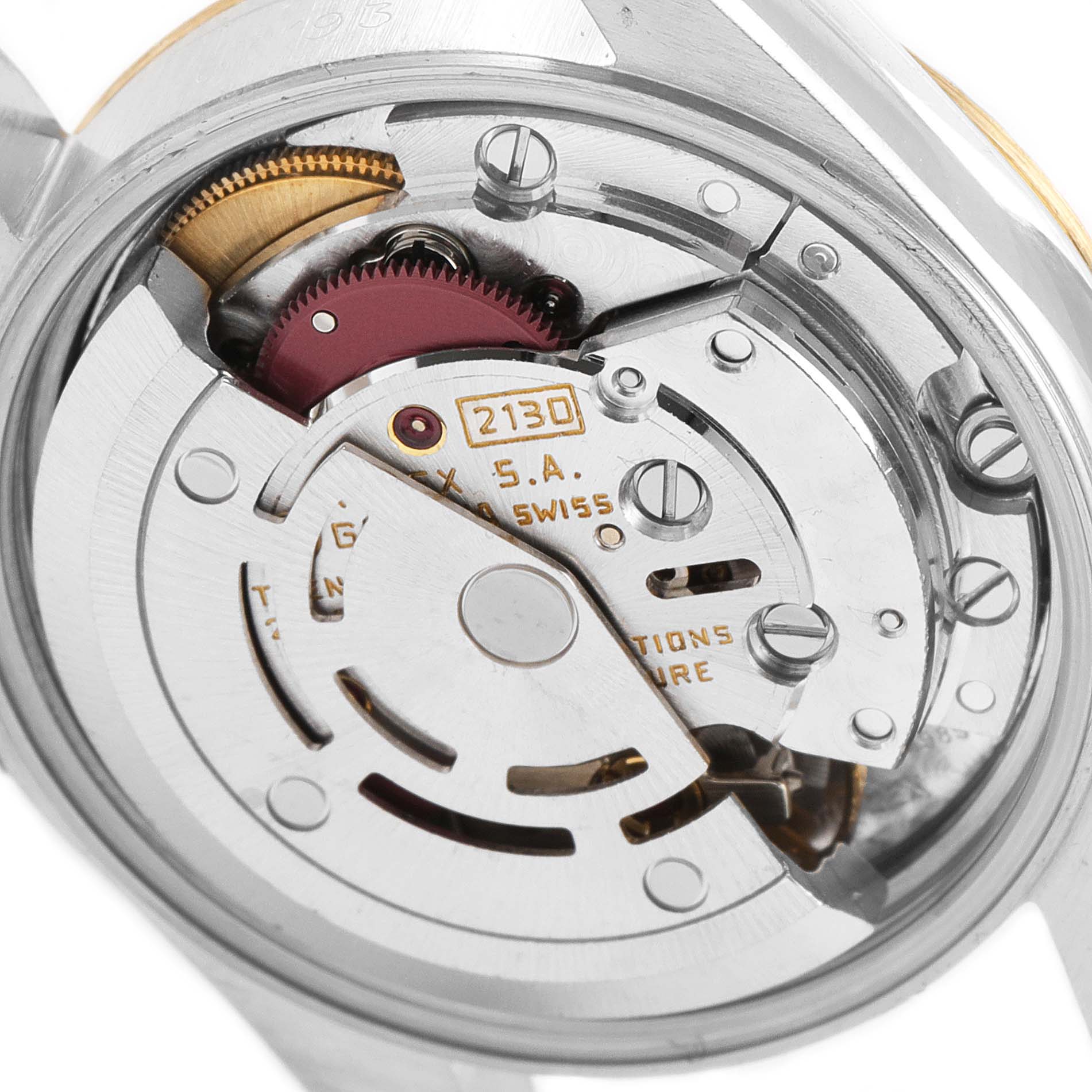 This image shows a close-up of the movement mechanism of the Rolex Oyster Perpetual 67193 Women
s Steel and Gold (two tone) Champagne Dial 67193 Women
s Steel and Gold (two tone) Champagne Dial watch.
