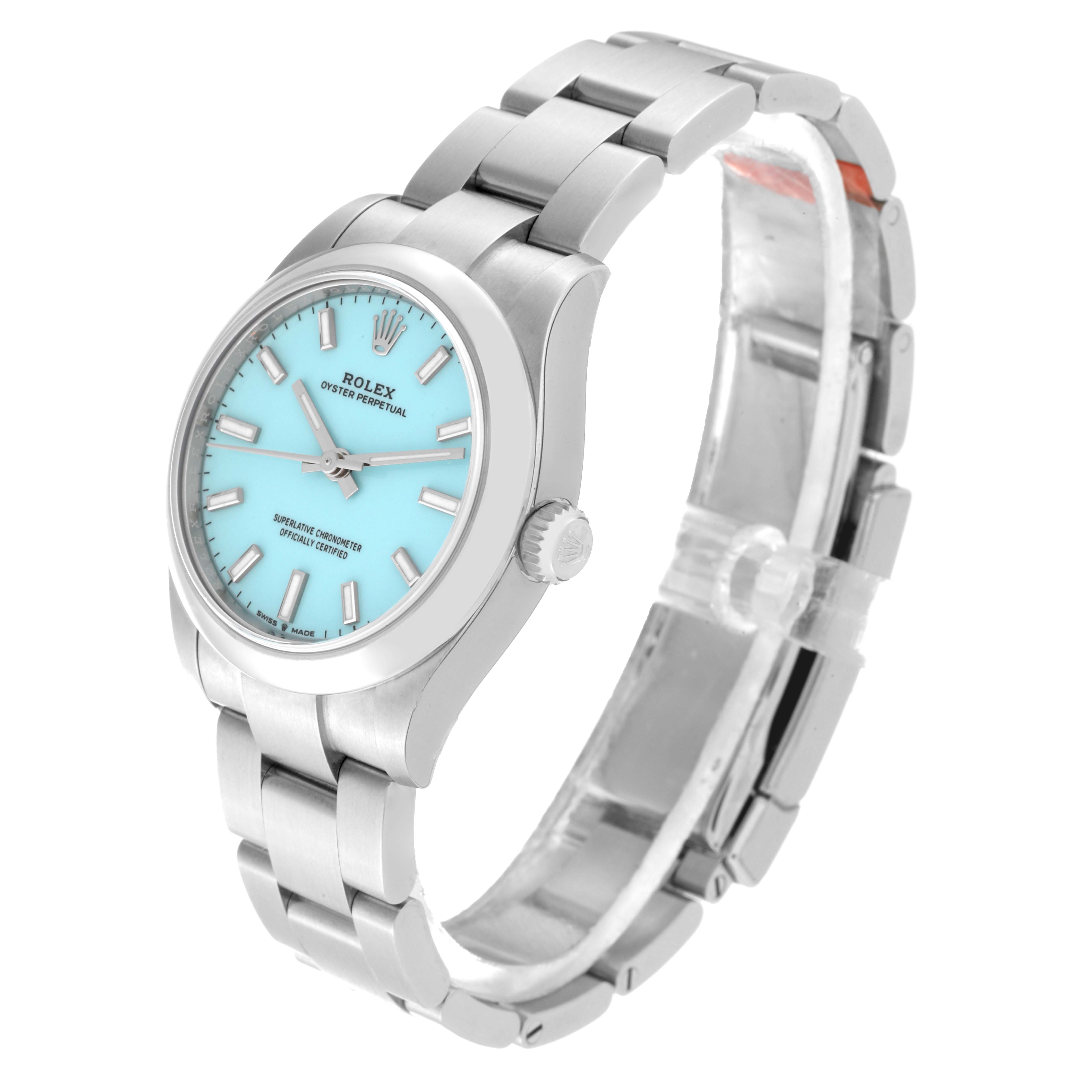 The image shows a Rolex Mid-Size 277200 Women
s Stainless Steel Blue Dial 277200 Women
s Stainless Steel Blue Dial Oyster Perpetual watch at a slight side angle, displaying its face, case, and bracelet.