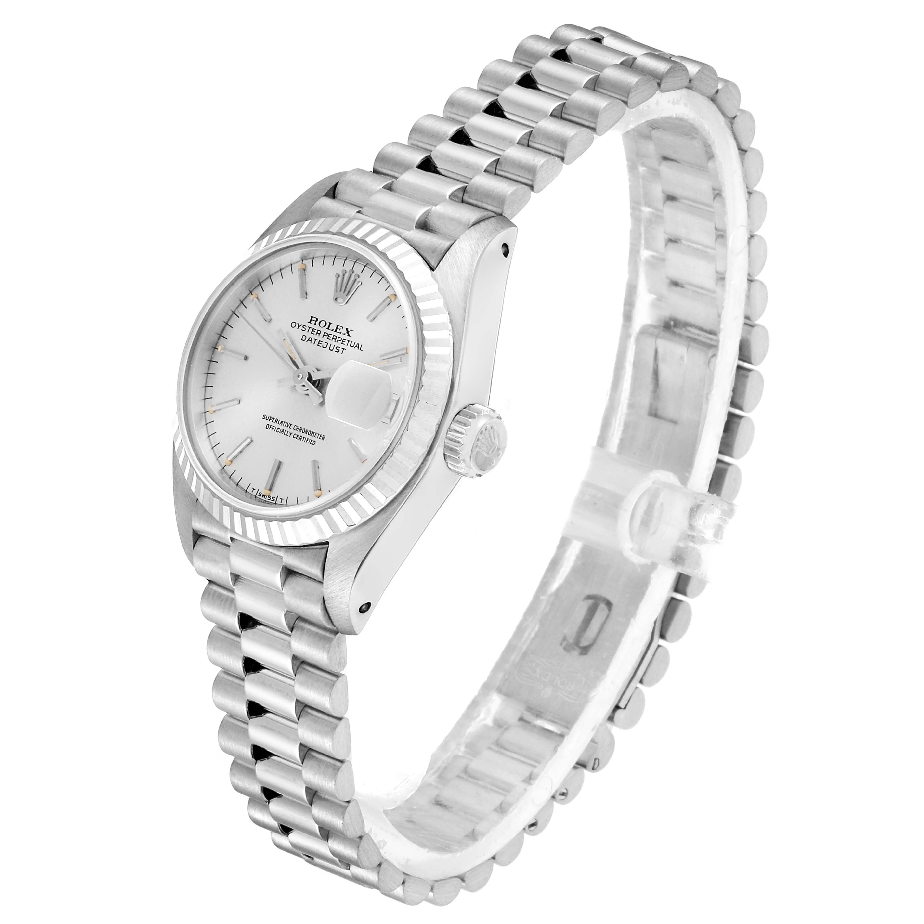 The Rolex President 69179 Women
s White Gold Silver Dial 69179 Women
s White Gold Silver Dial model watch is shown at an angled view, displaying its face, crown, and bracelet.