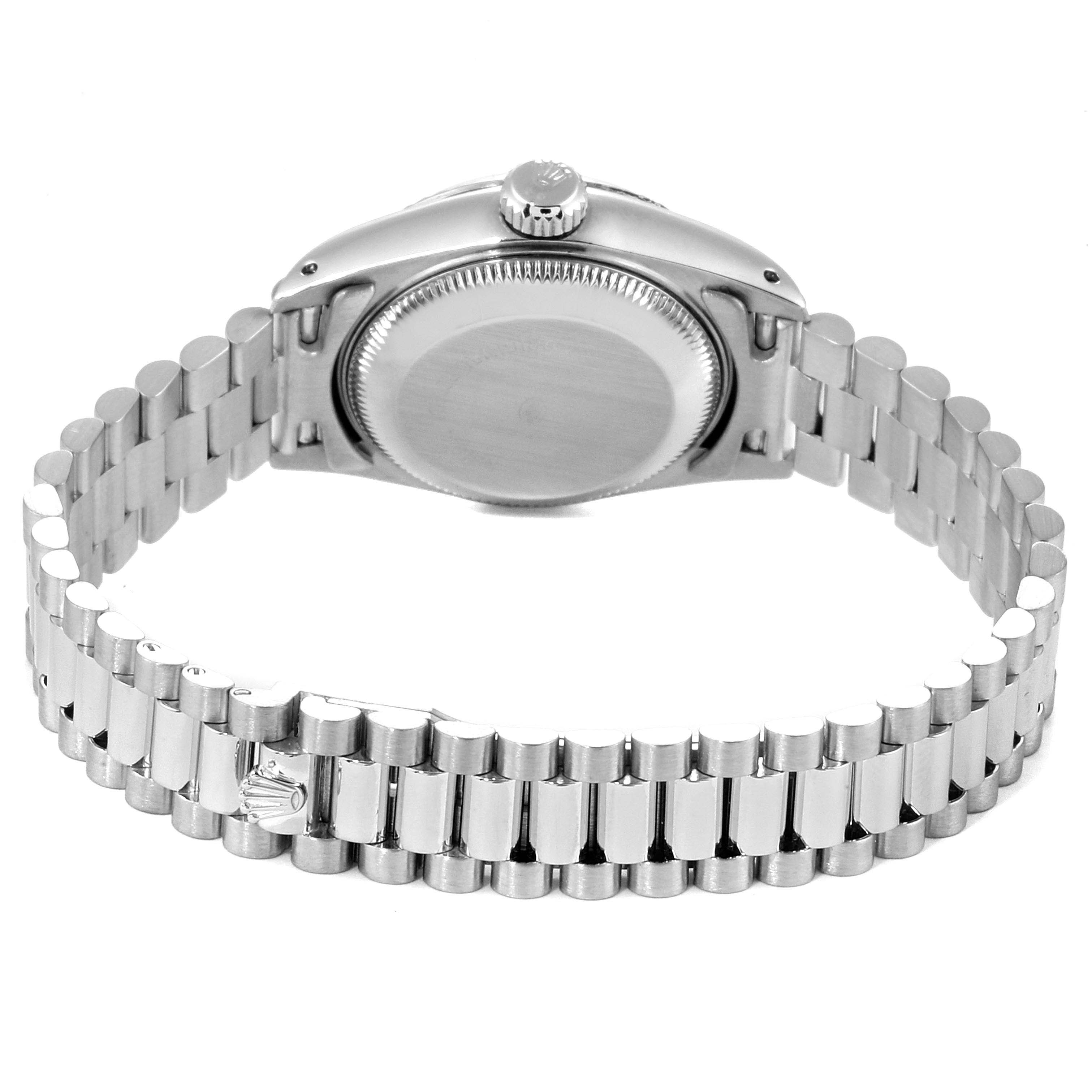 This image shows the back of a Rolex President 69179 Women
s White Gold Silver Dial 69179 Women
s White Gold Silver Dial model watch, highlighting its bracelet and clasp.