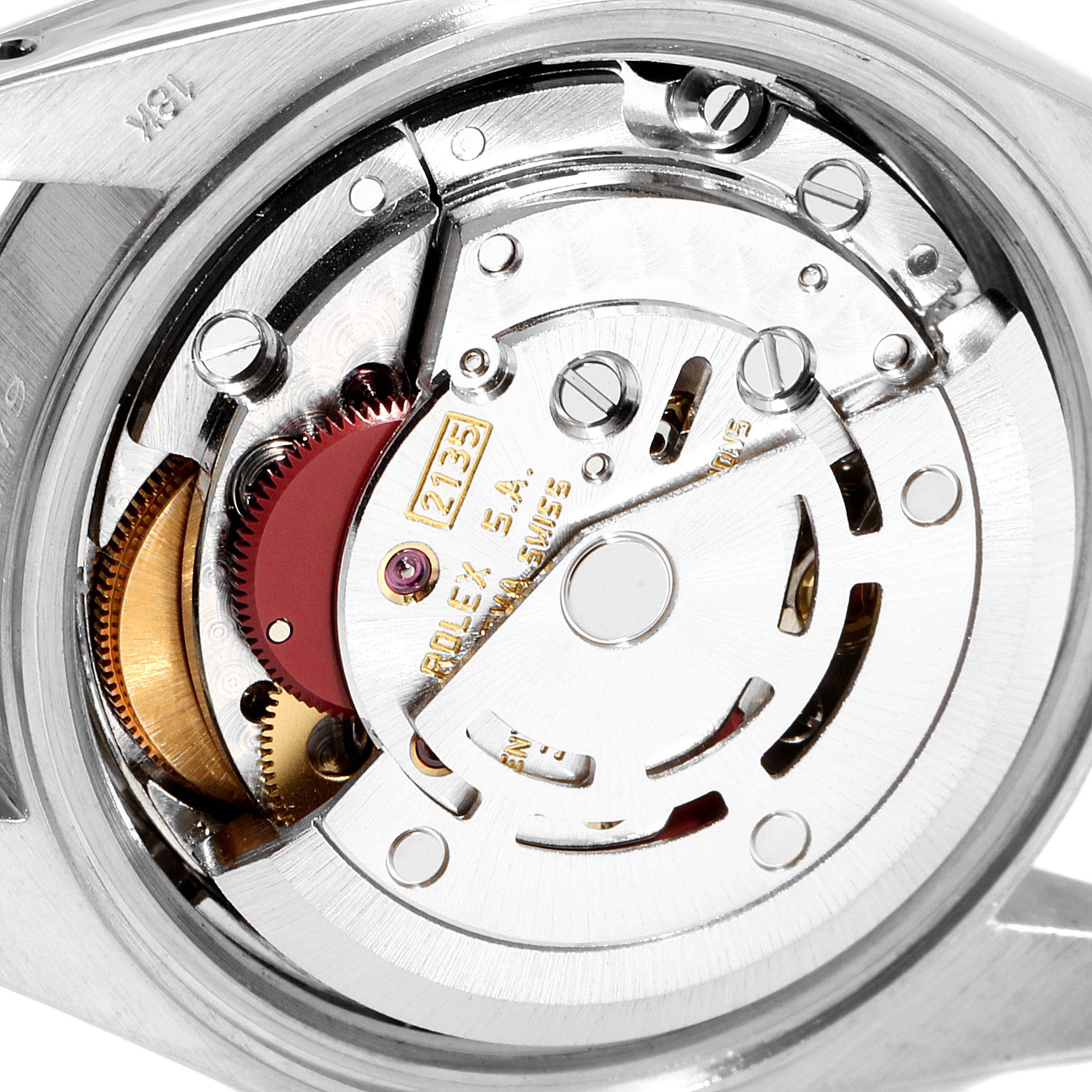 This image shows the intricate inner mechanism of the Rolex President 69179 Women
s White Gold Silver Dial 69179 Women
s White Gold Silver Dial model, highlighting its gears and movement parts.